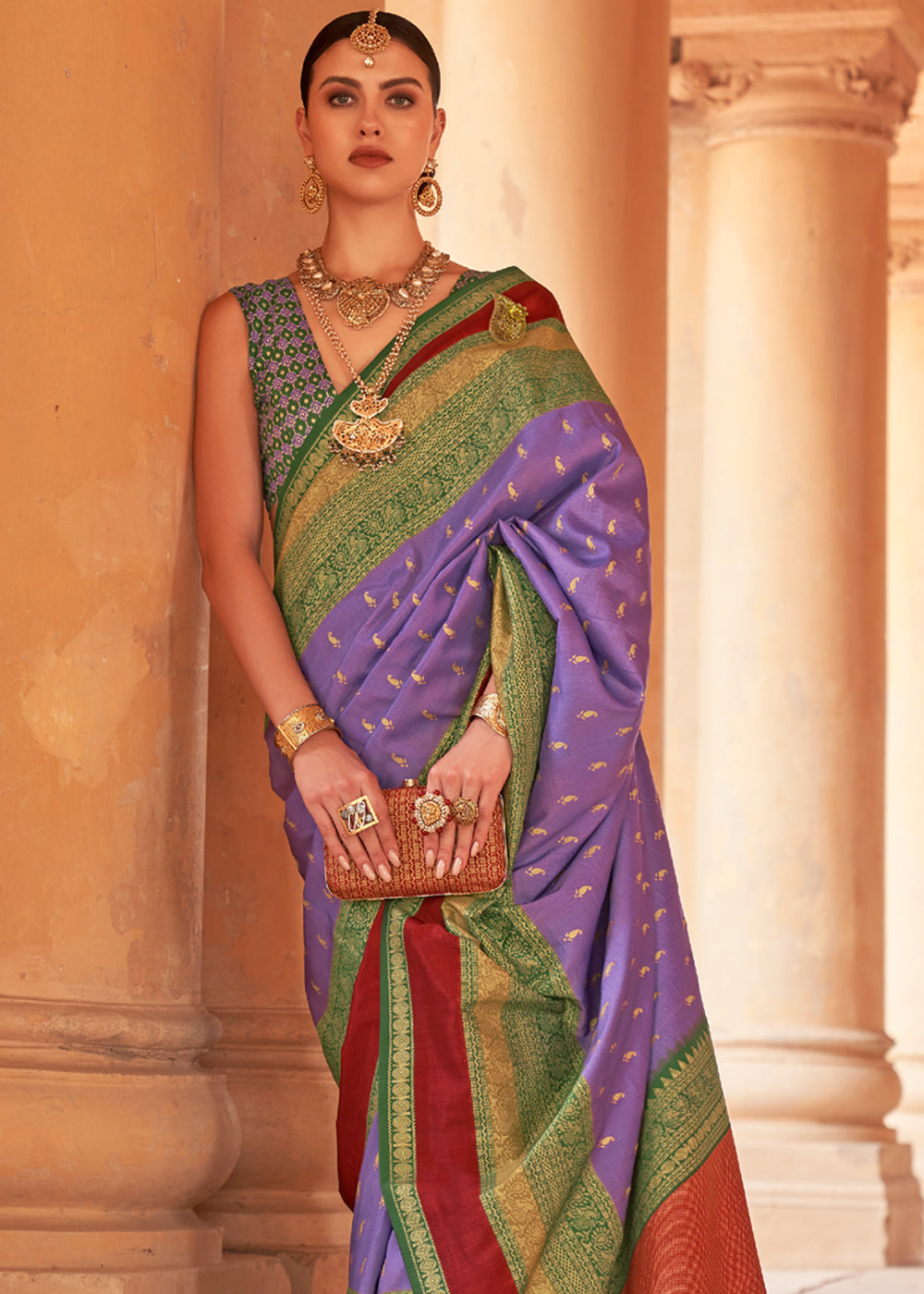 Strikemaster Purple and Green Woven Patola Soft Silk Saree