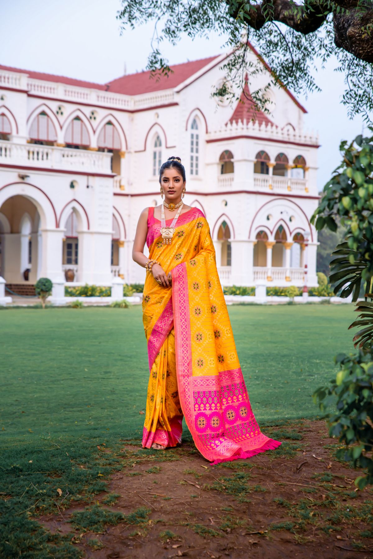 Sunflower Yellow and Green Banarasi Patola Silk Saree