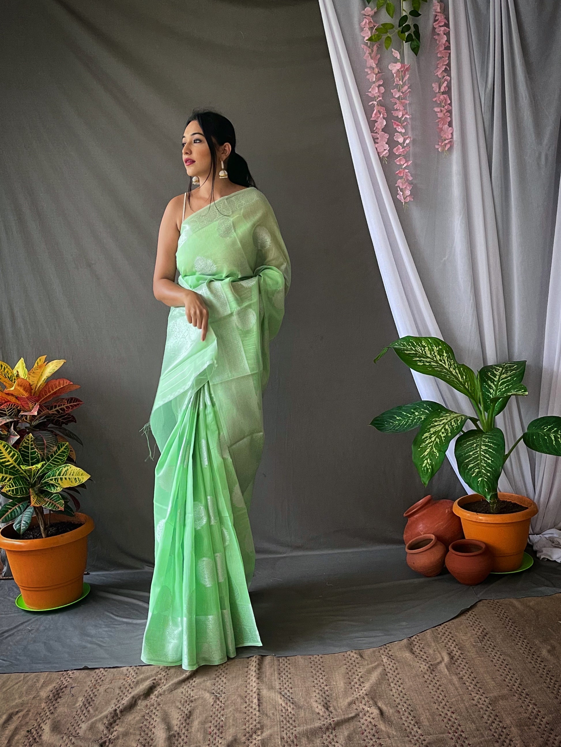 De York Green Linen Silver Zari Woven Saree