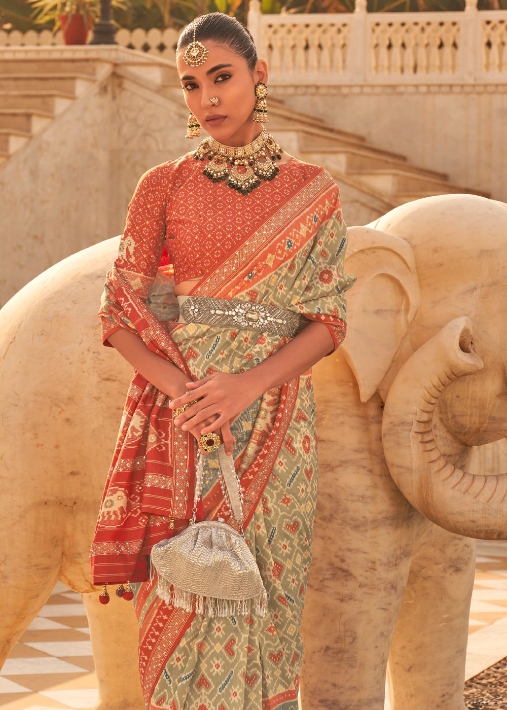 Domino Grey and Orange Woven Patola Silk Saree