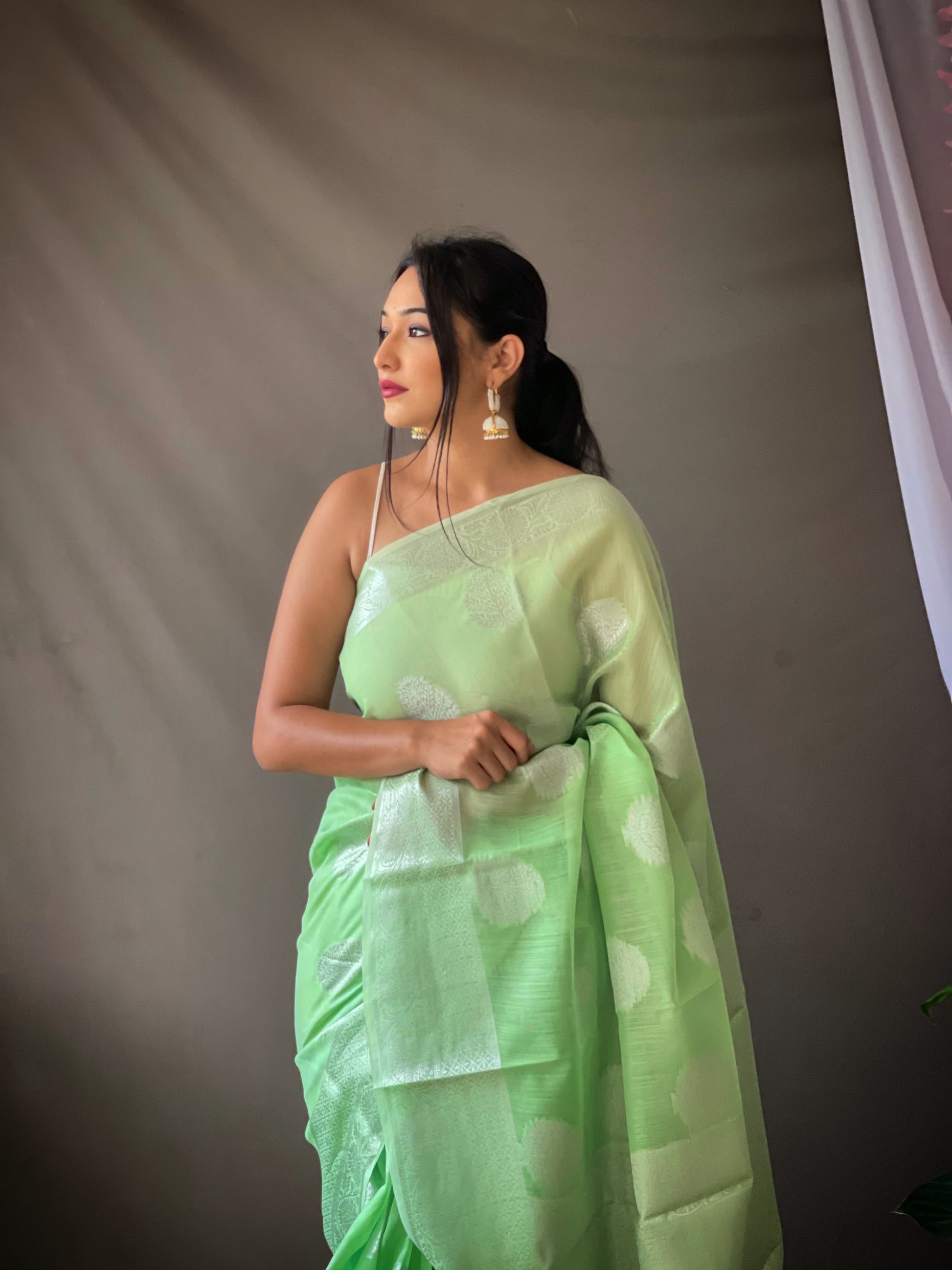 De York Green Linen Silver Zari Woven Saree