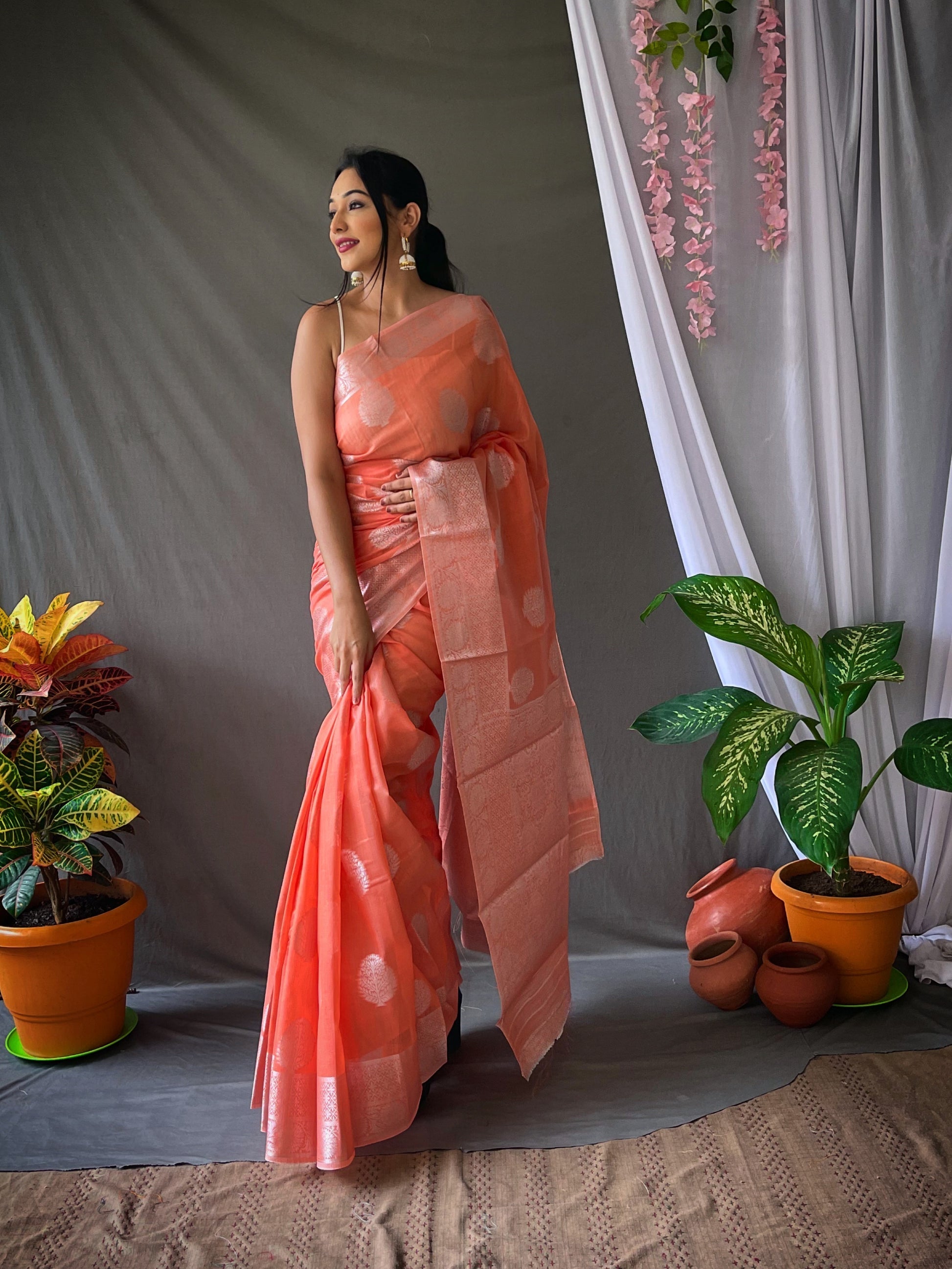 Tacao Peach Linen Silver Zari Woven Saree