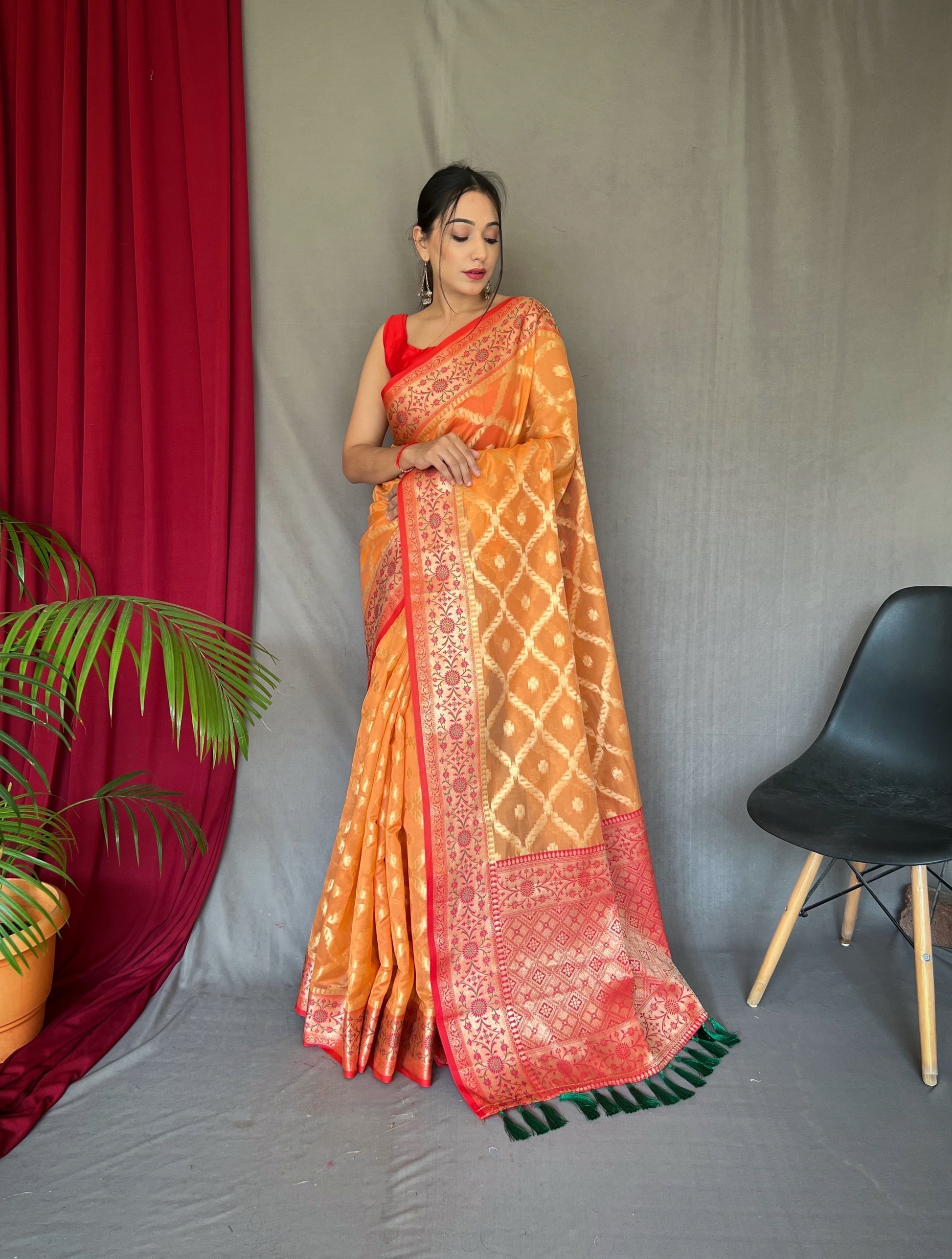 Koromiko Orange Woven Banarasi Organza Silk Saree