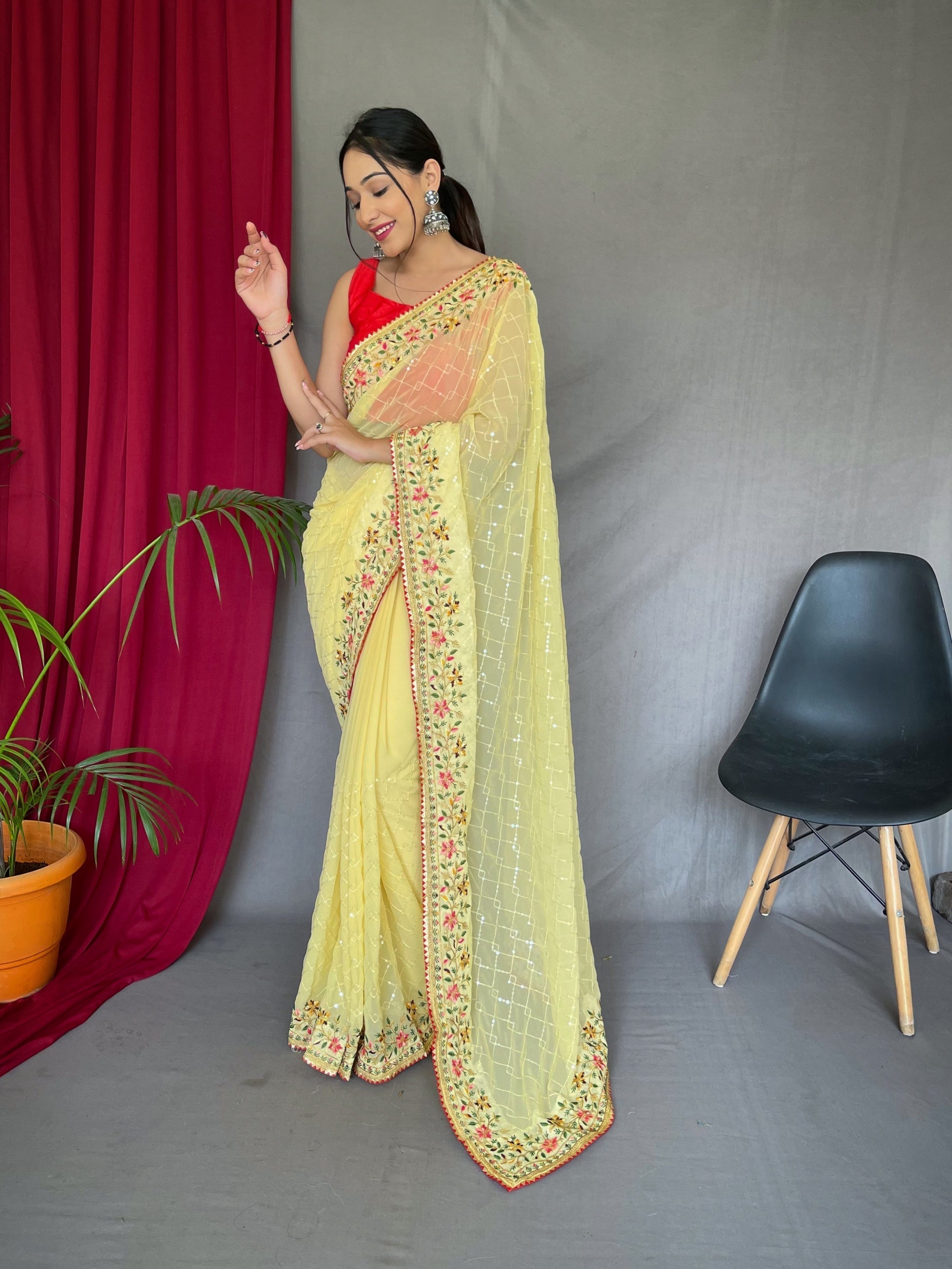 Lemon Yellow Georgette Sequins Designer Saree with Embroidered Border