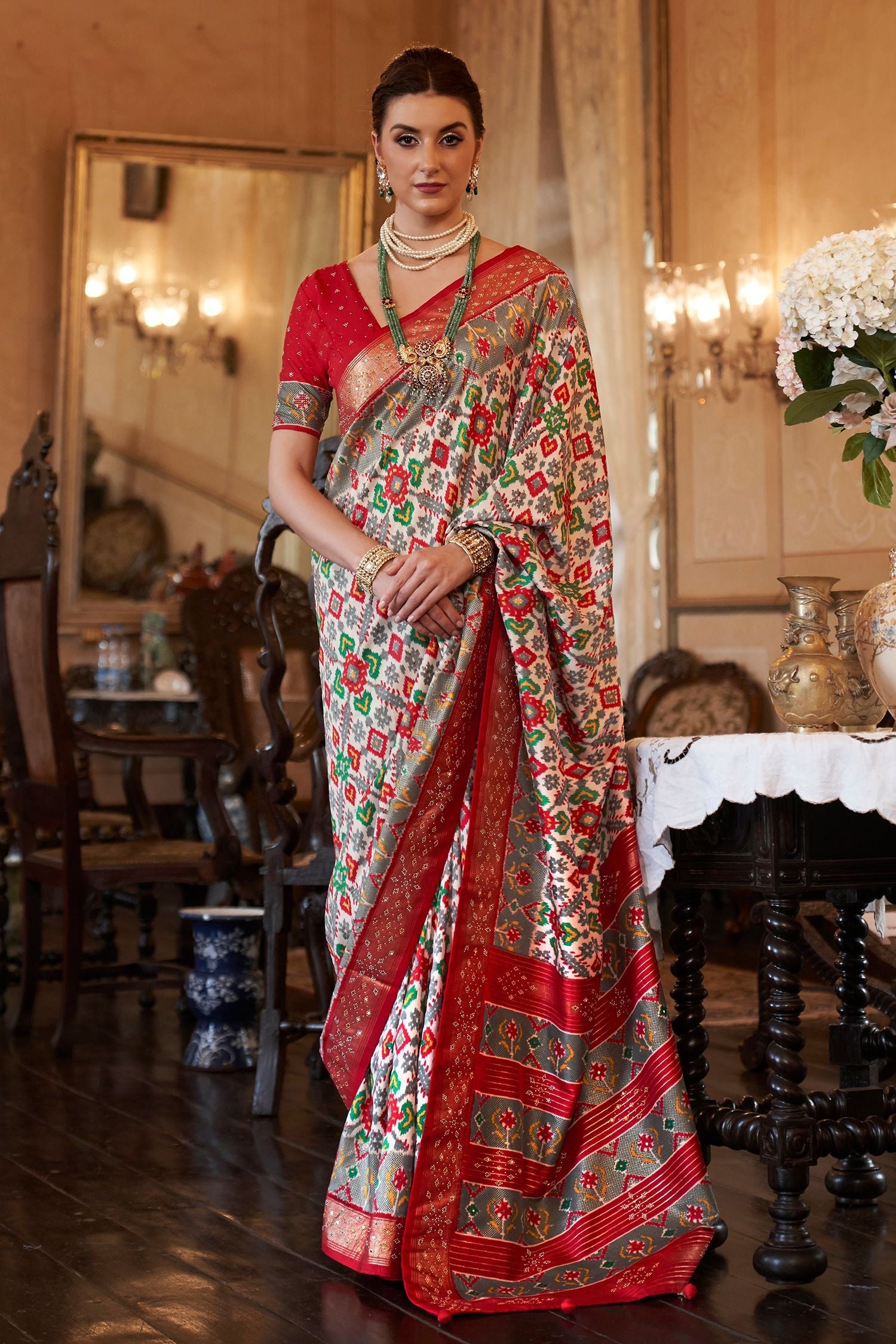 Beige Cream and Red Printed Patola Silk Saree