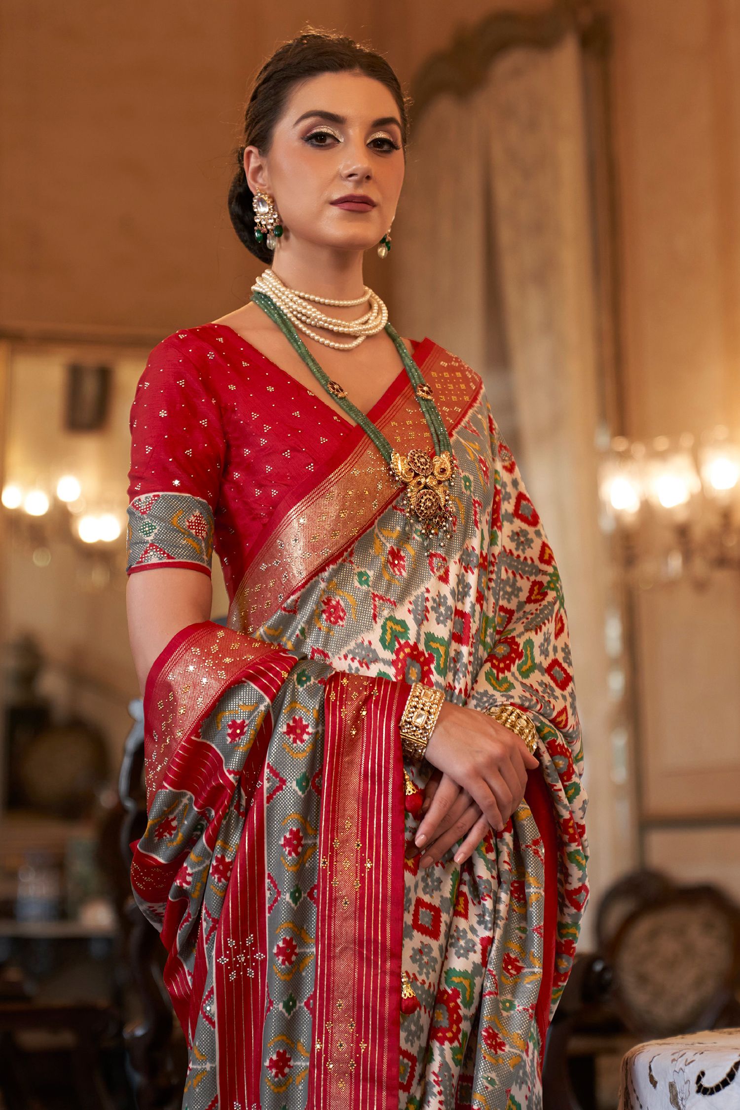 Beige Cream and Red Printed Patola Silk Saree