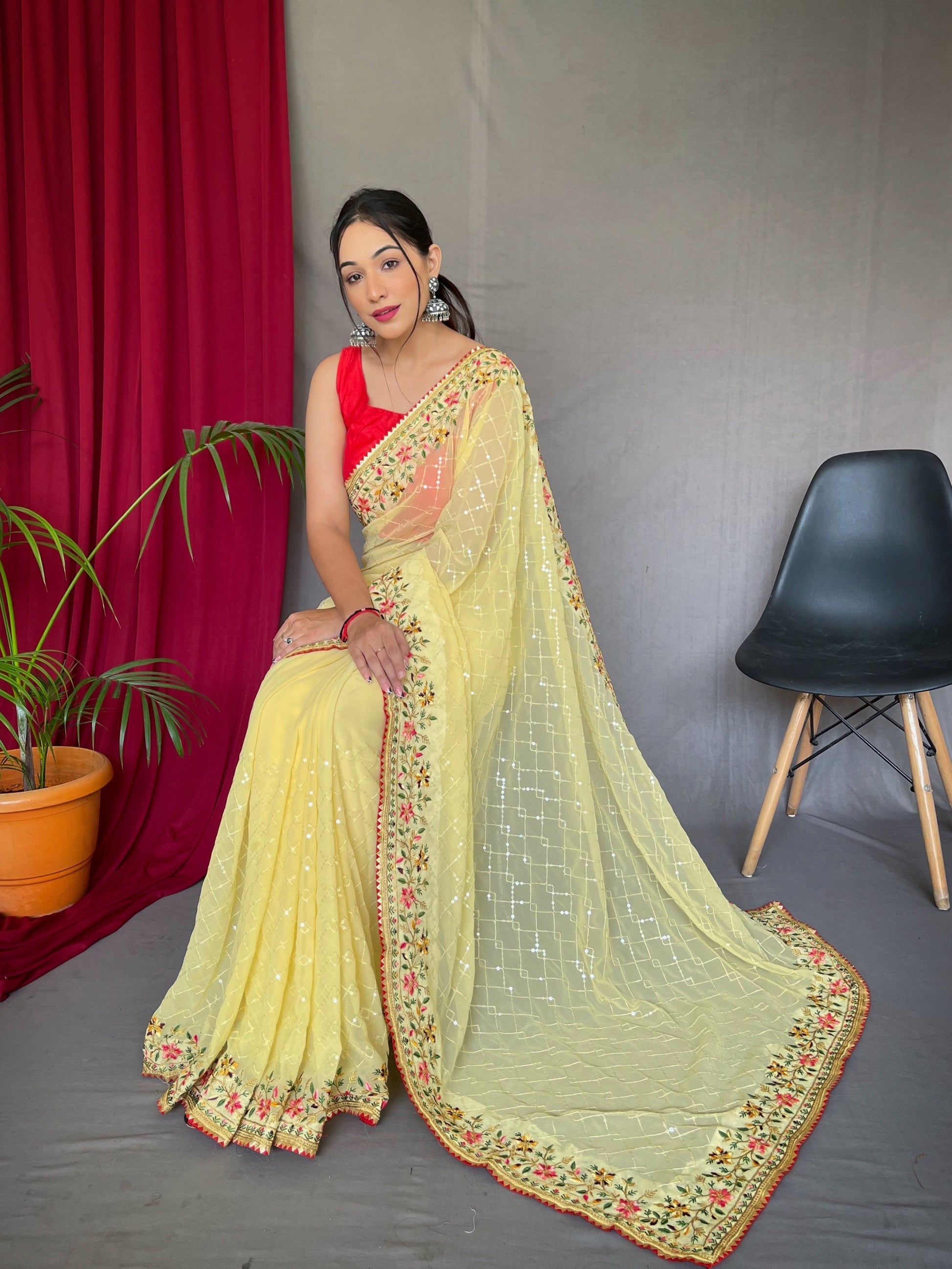 Lemon Yellow Georgette Sequins Designer Saree with Embroidered Border