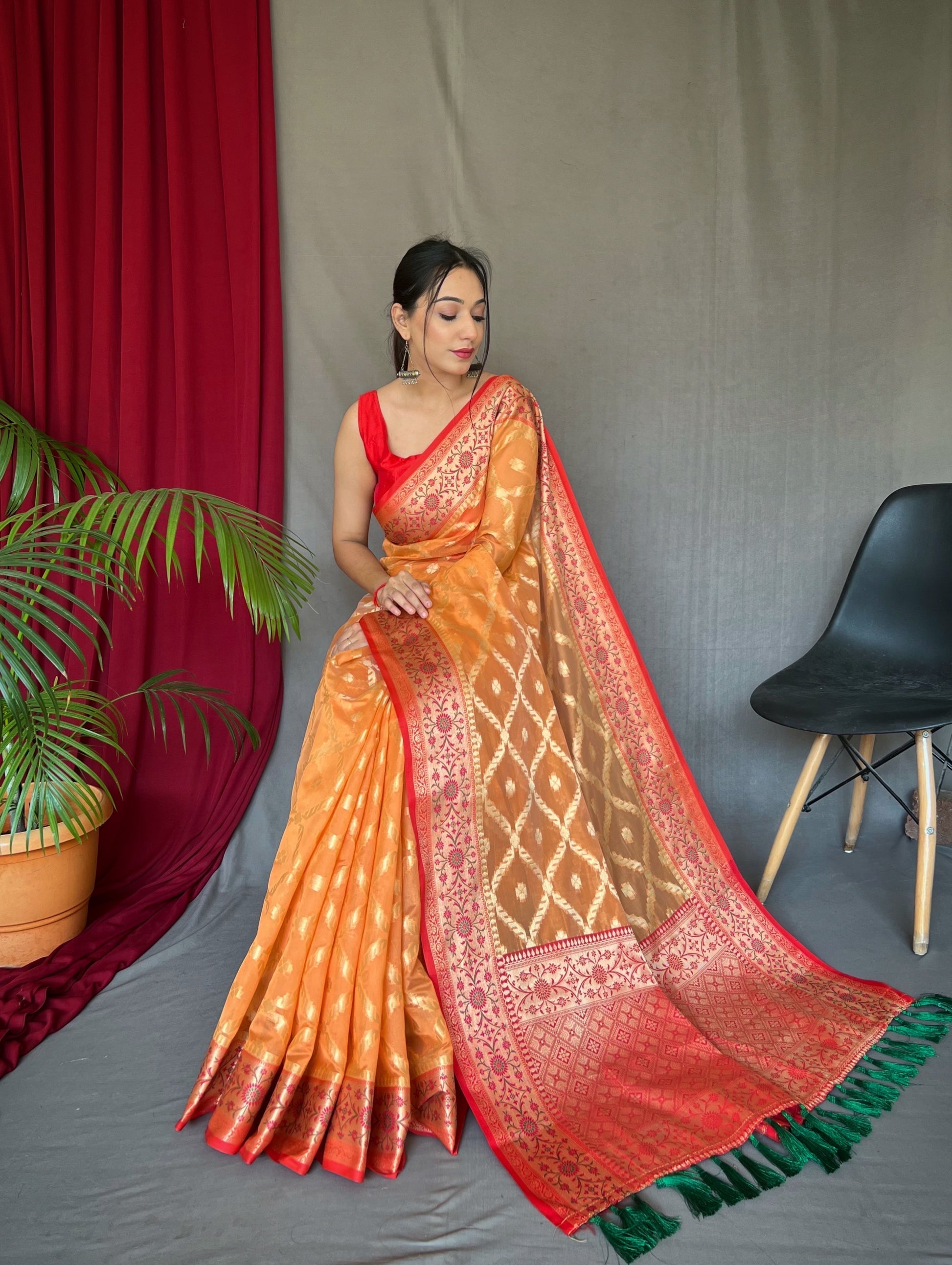 Koromiko Orange Woven Banarasi Organza Silk Saree