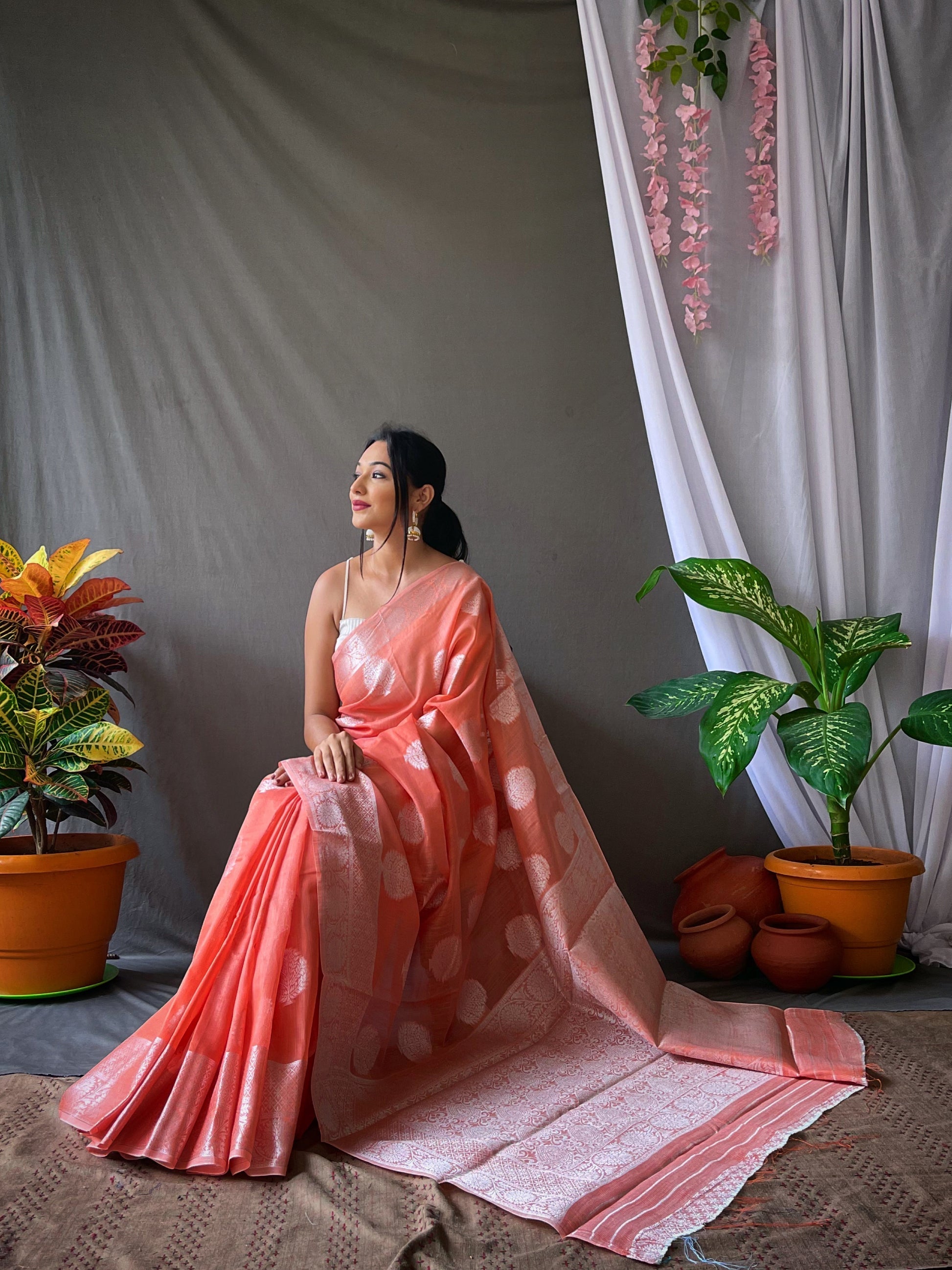 Tacao Peach Linen Silver Zari Woven Saree