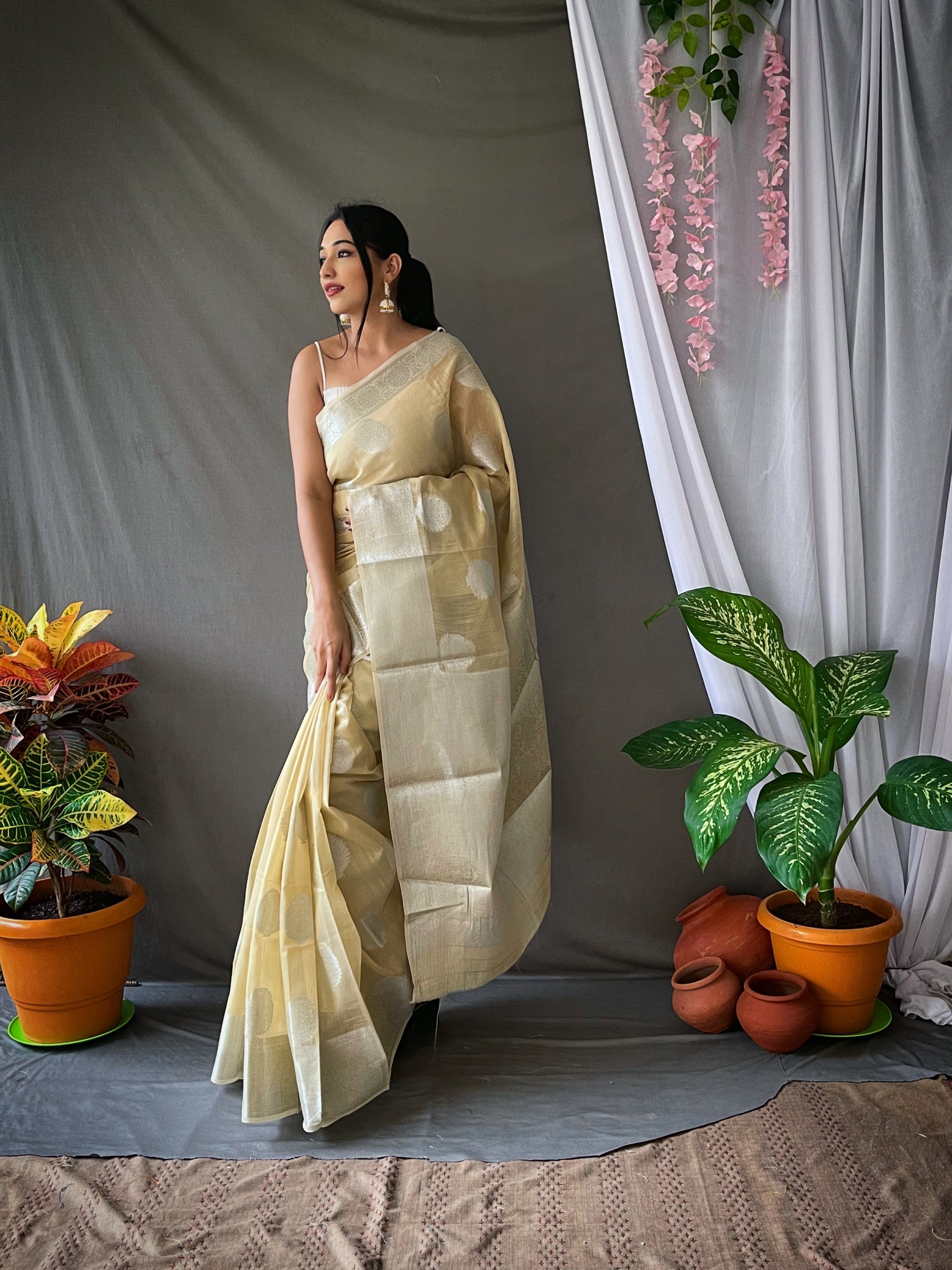 Tusk Cream Linen Silver Zari Woven Saree