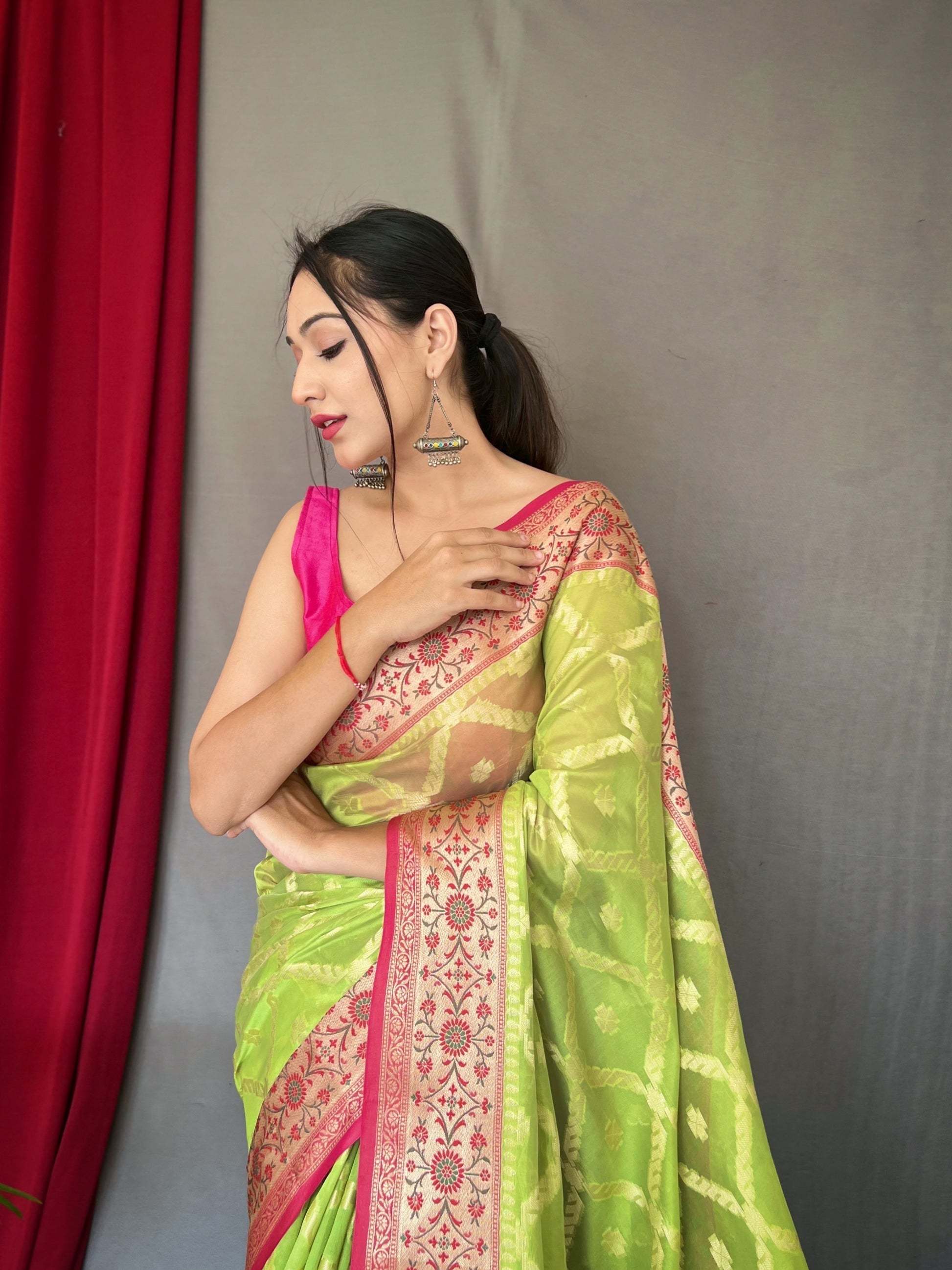 Tacha Green Woven Banarasi Organza Silk Saree