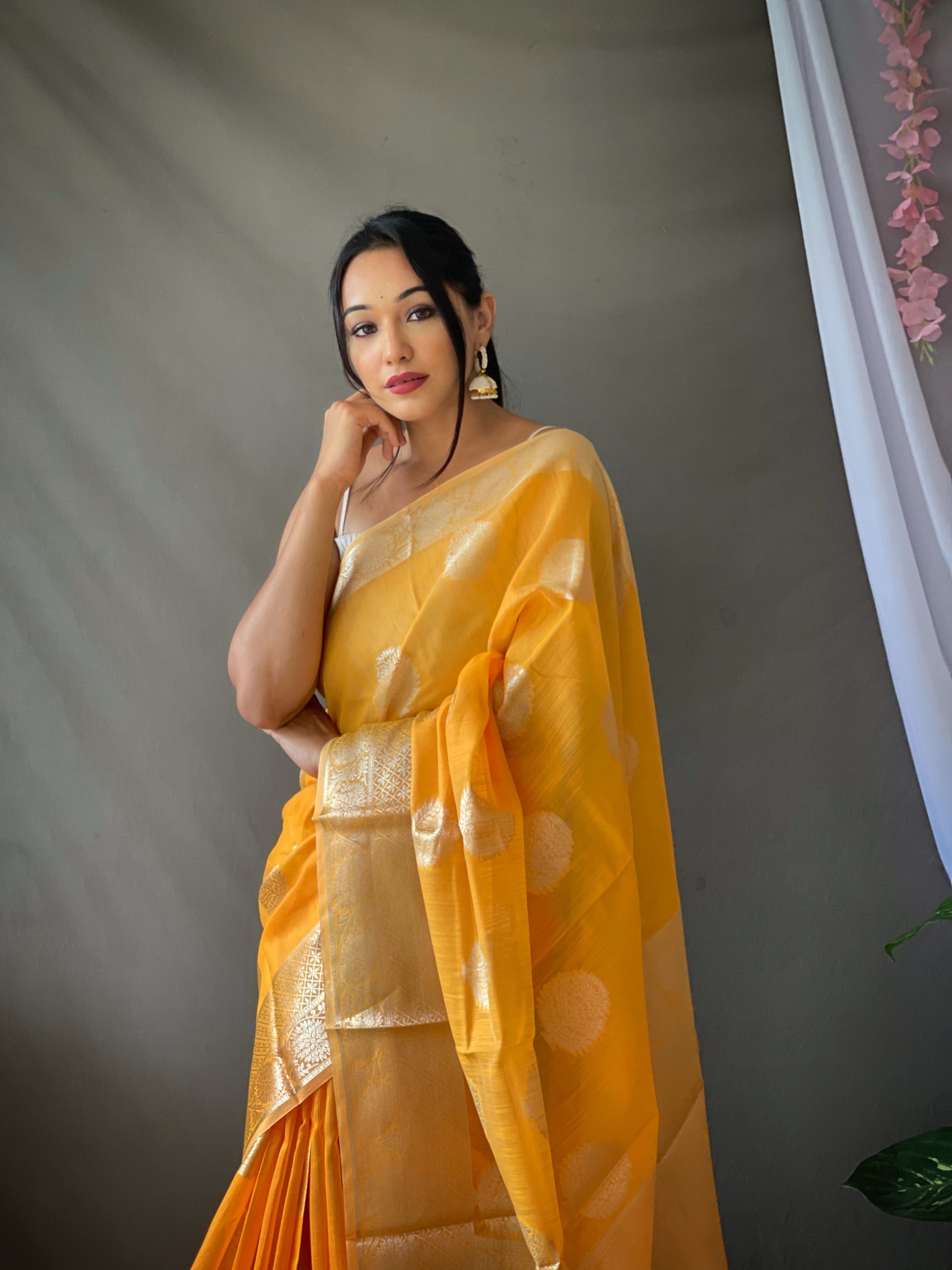 Tainoi Orange Linen Silver Zari Woven Saree