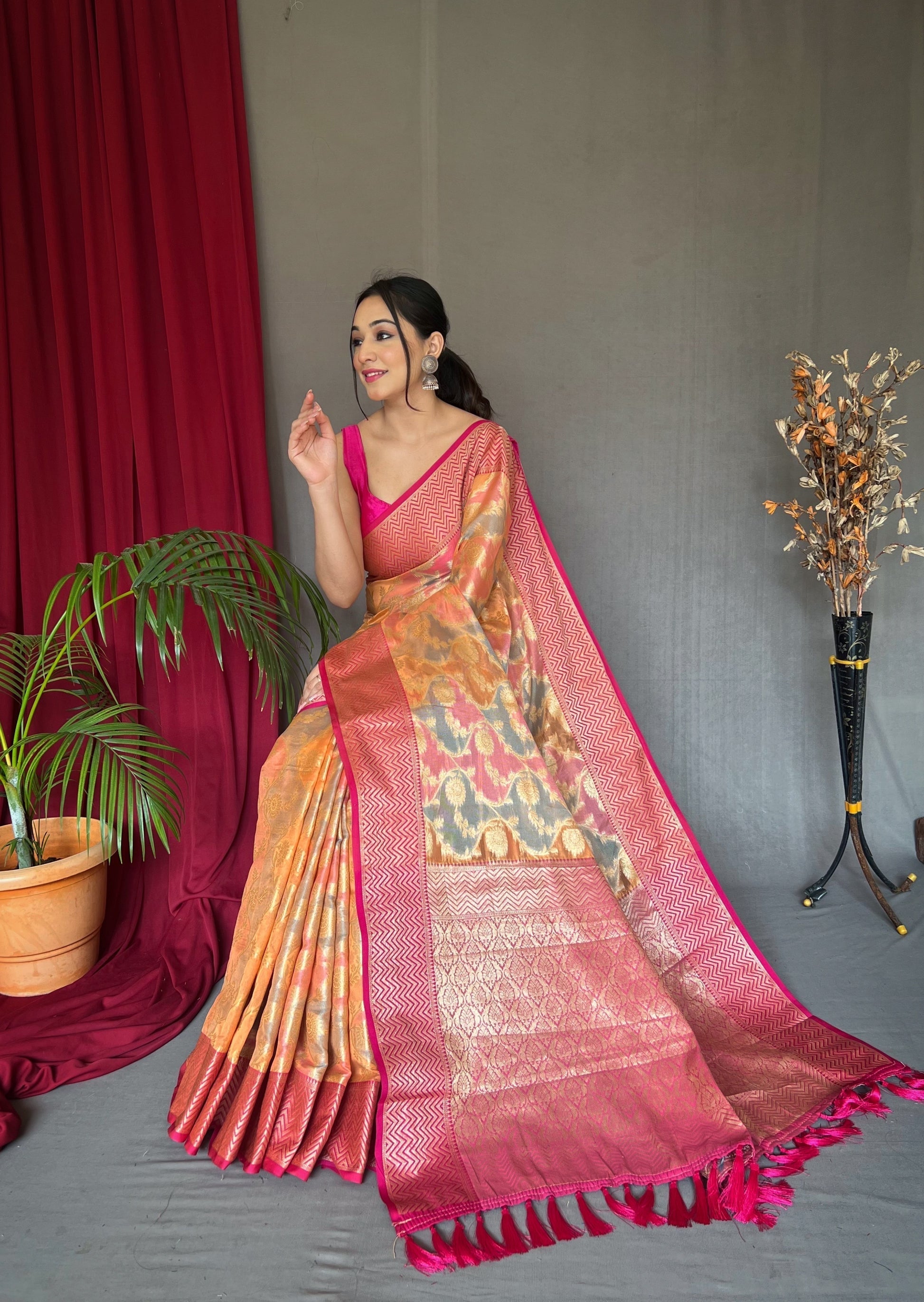 Melon Pink and Orange Woven Organza Silk Saree