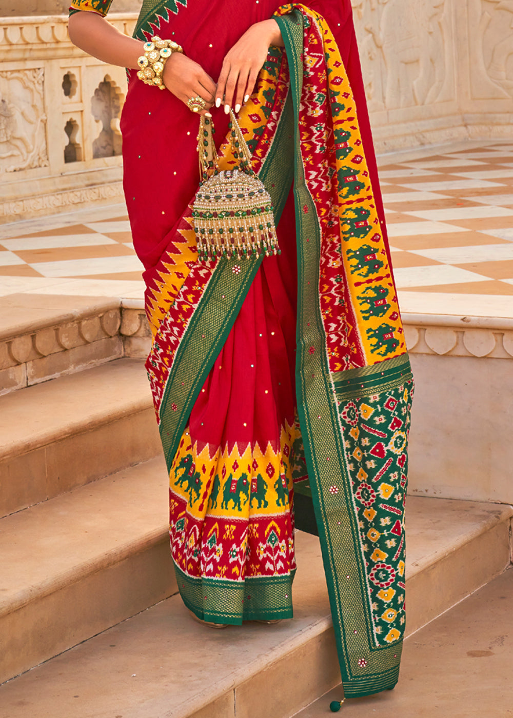 Rusty Red and Green Woven Patola Silk Saree