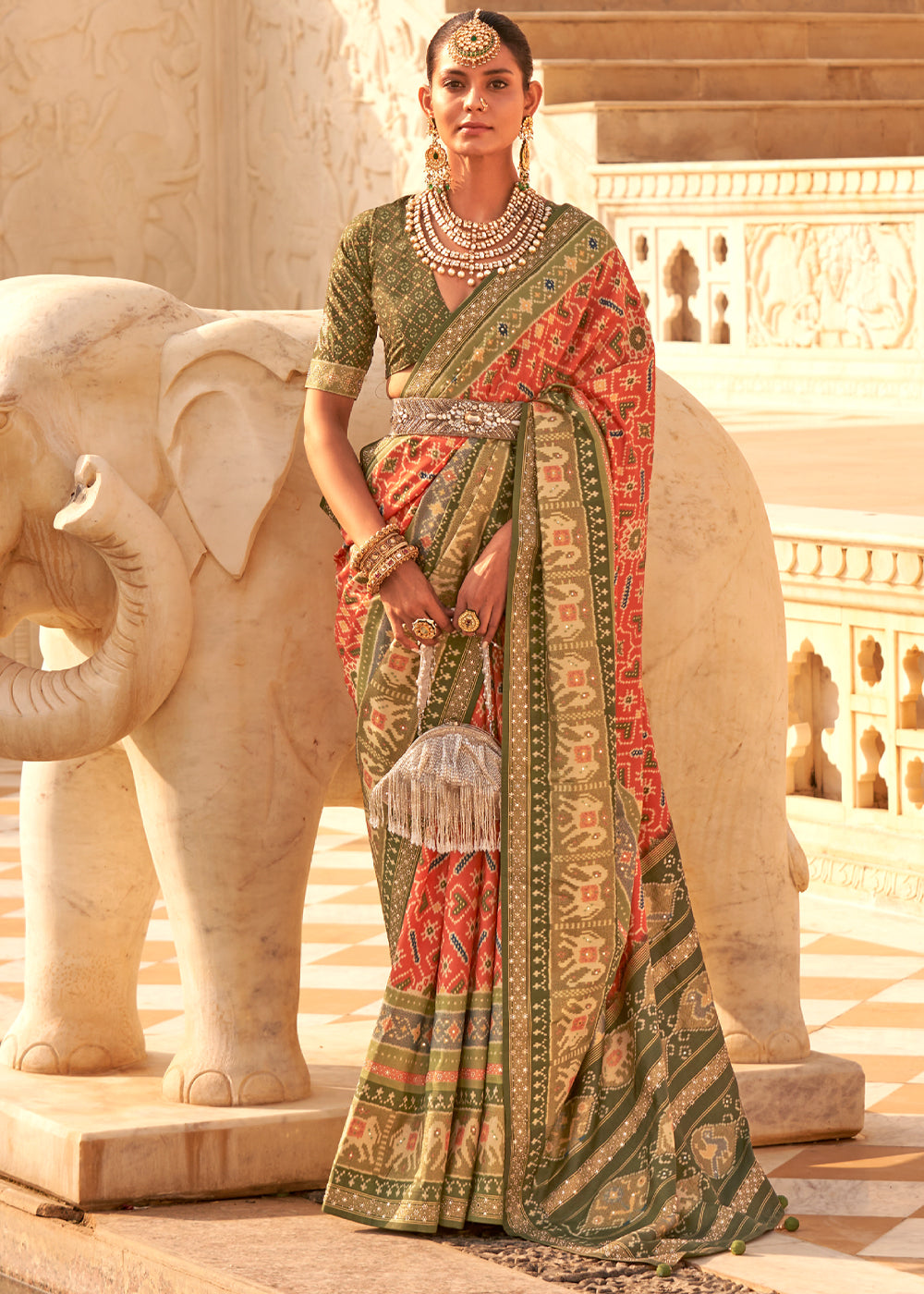 Sandy Orange and Green Handloom  Woven Patola Silk Saree