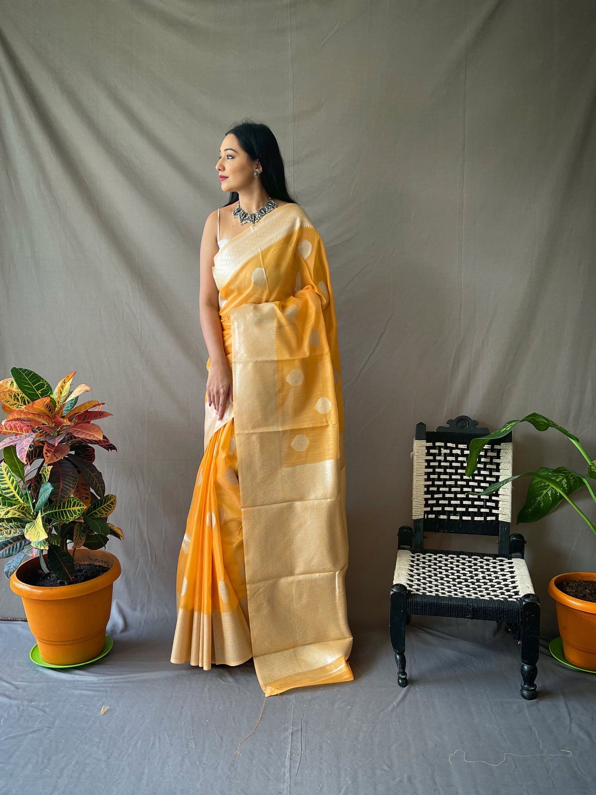 Yellowish Orange Linen Silver Zari Woven Saree