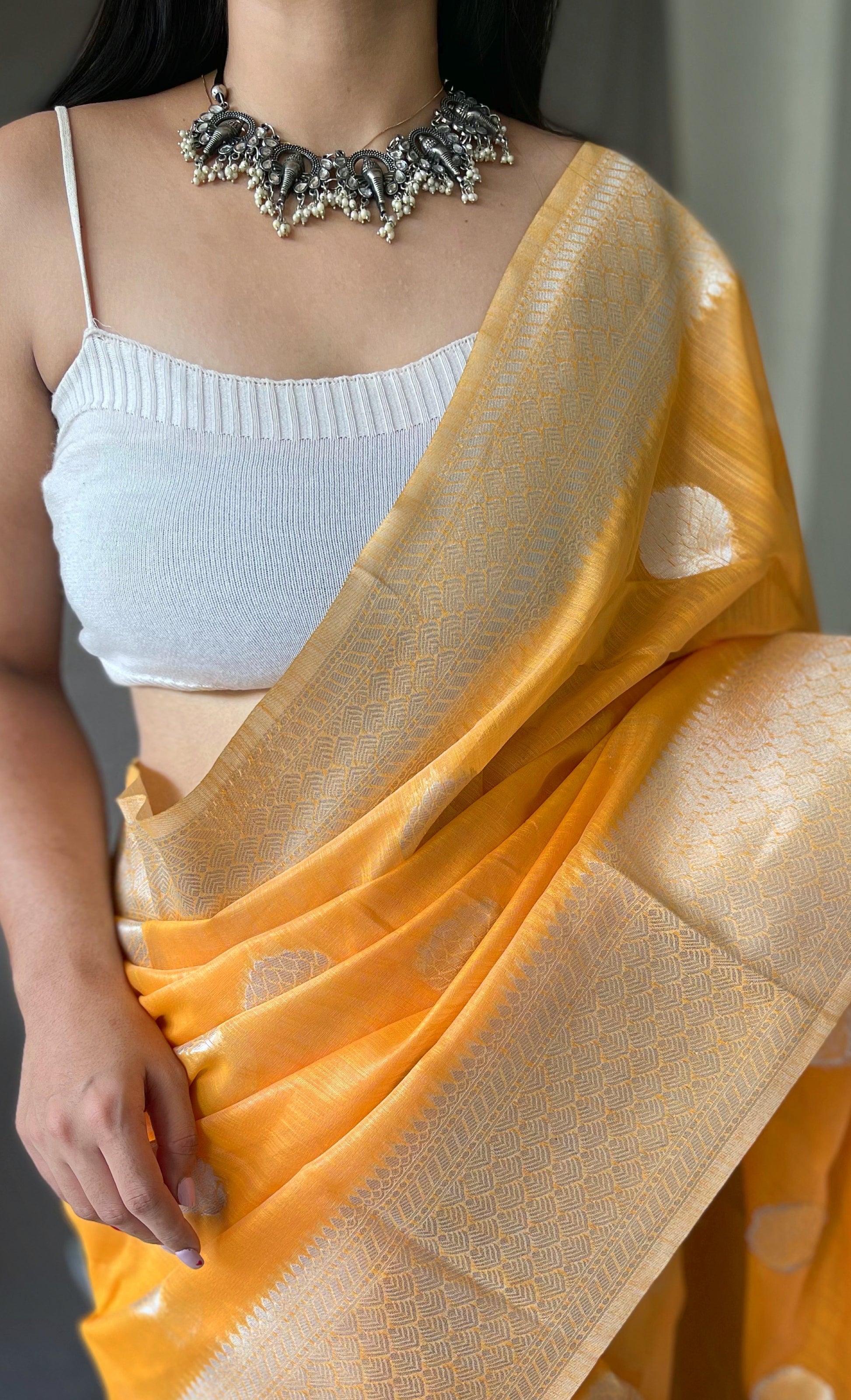 Yellowish Orange Linen Silver Zari Woven Saree