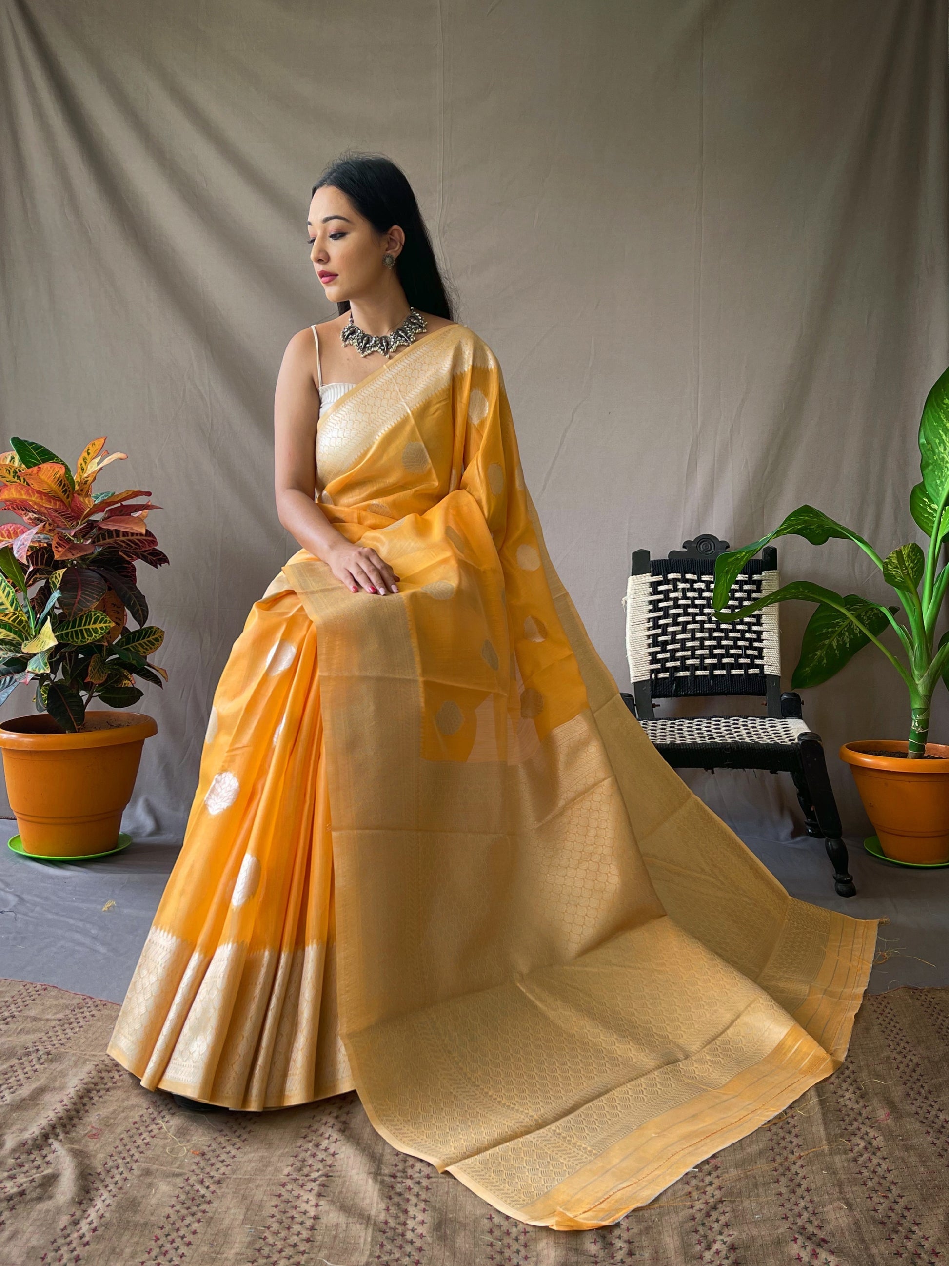 Yellowish Orange Linen Silver Zari Woven Saree