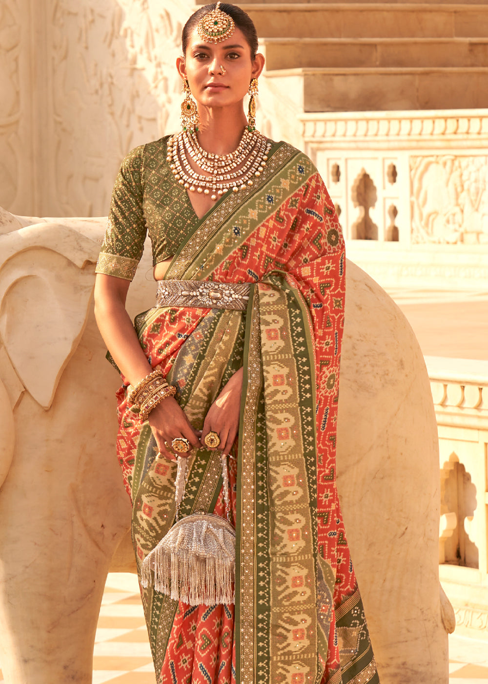 Sandy Orange and Green Handloom  Woven Patola Silk Saree