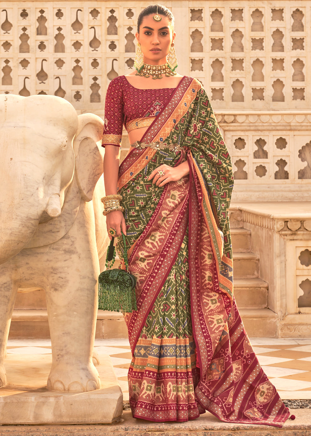 Sycamore Green and Maroon Woven Patola Silk Saree