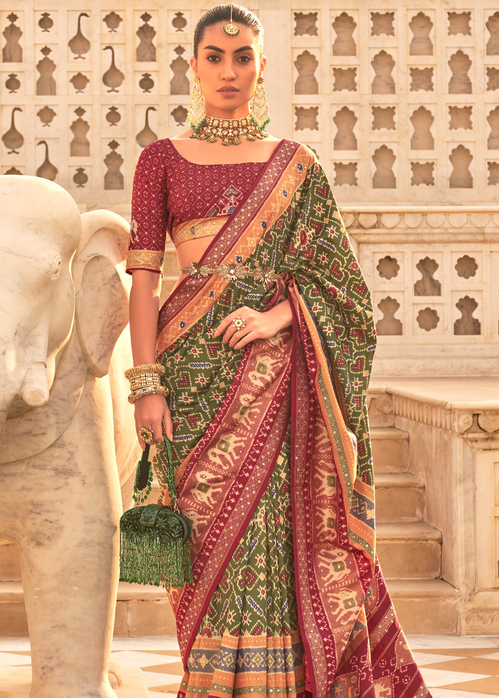 Sycamore Green and Maroon Woven Patola Silk Saree