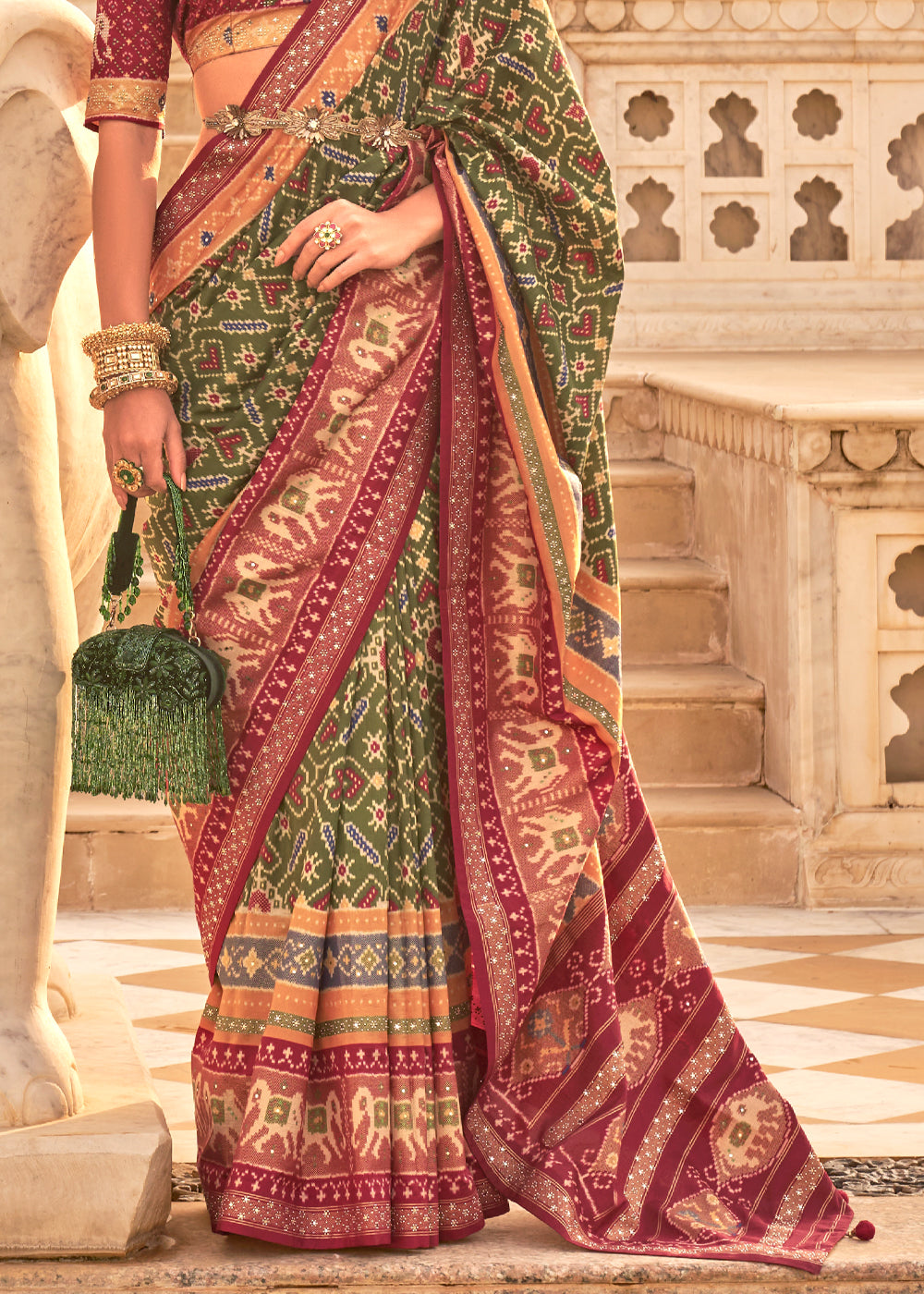 Sycamore Green and Maroon Woven Patola Silk Saree