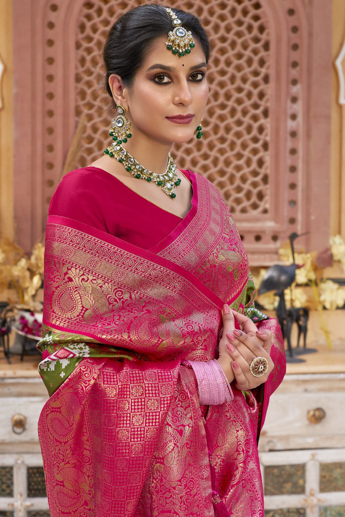 Dallas Green and Pink Designer Woven Patola Silk Saree