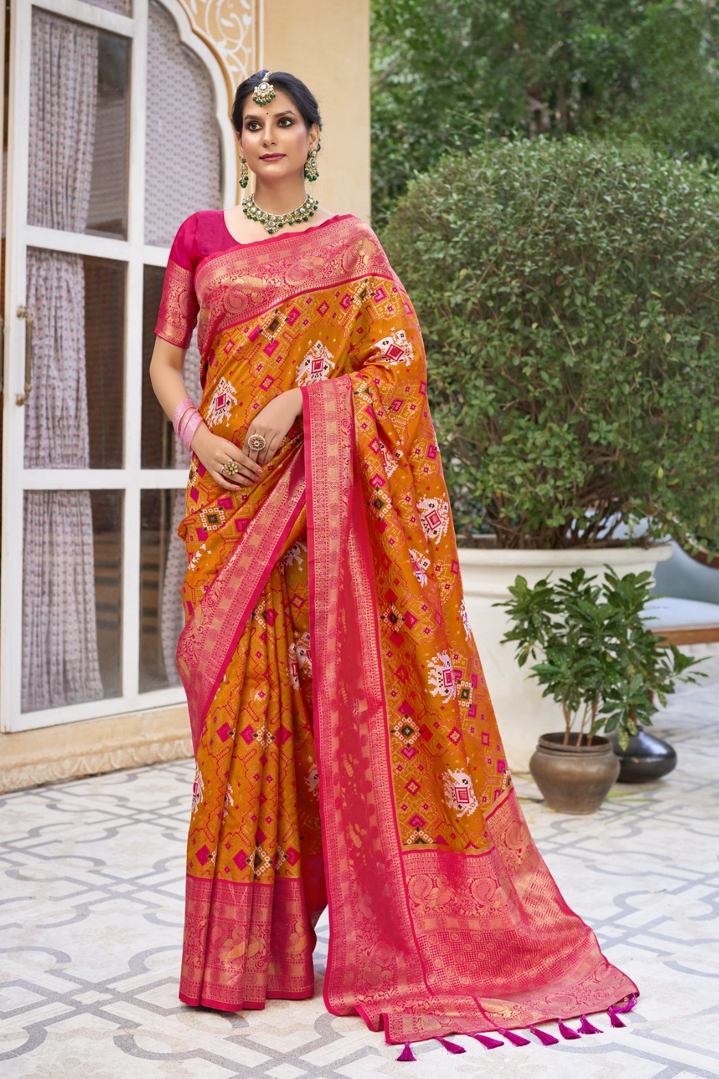 Tan Hide Orange Designer Woven Patola Silk Saree