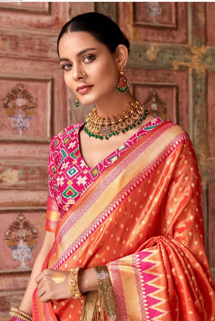 Cadmium Orange Woven Zari Banarasi Patola Silk Saree