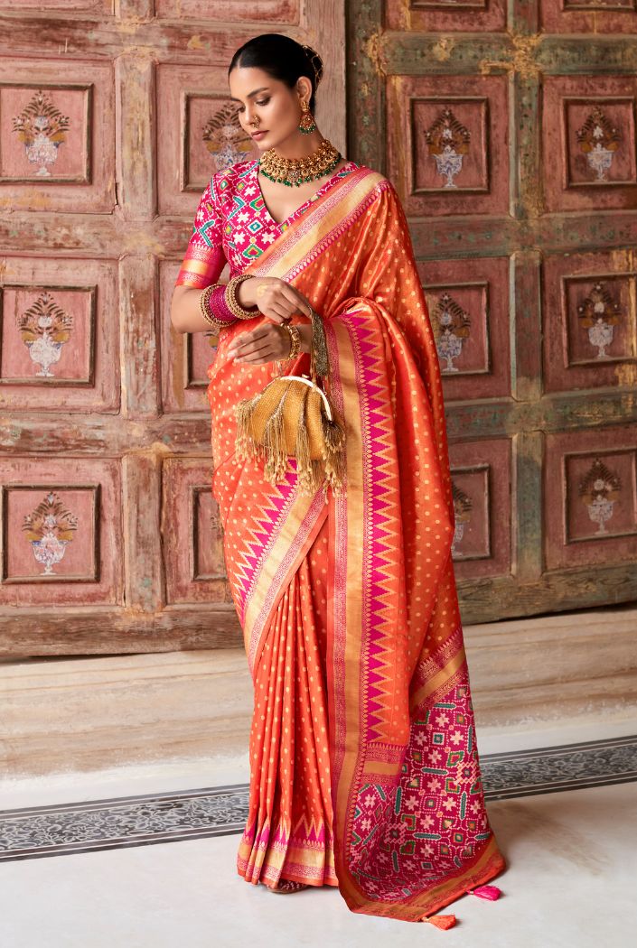 Cadmium Orange Woven Zari Banarasi Patola Silk Saree