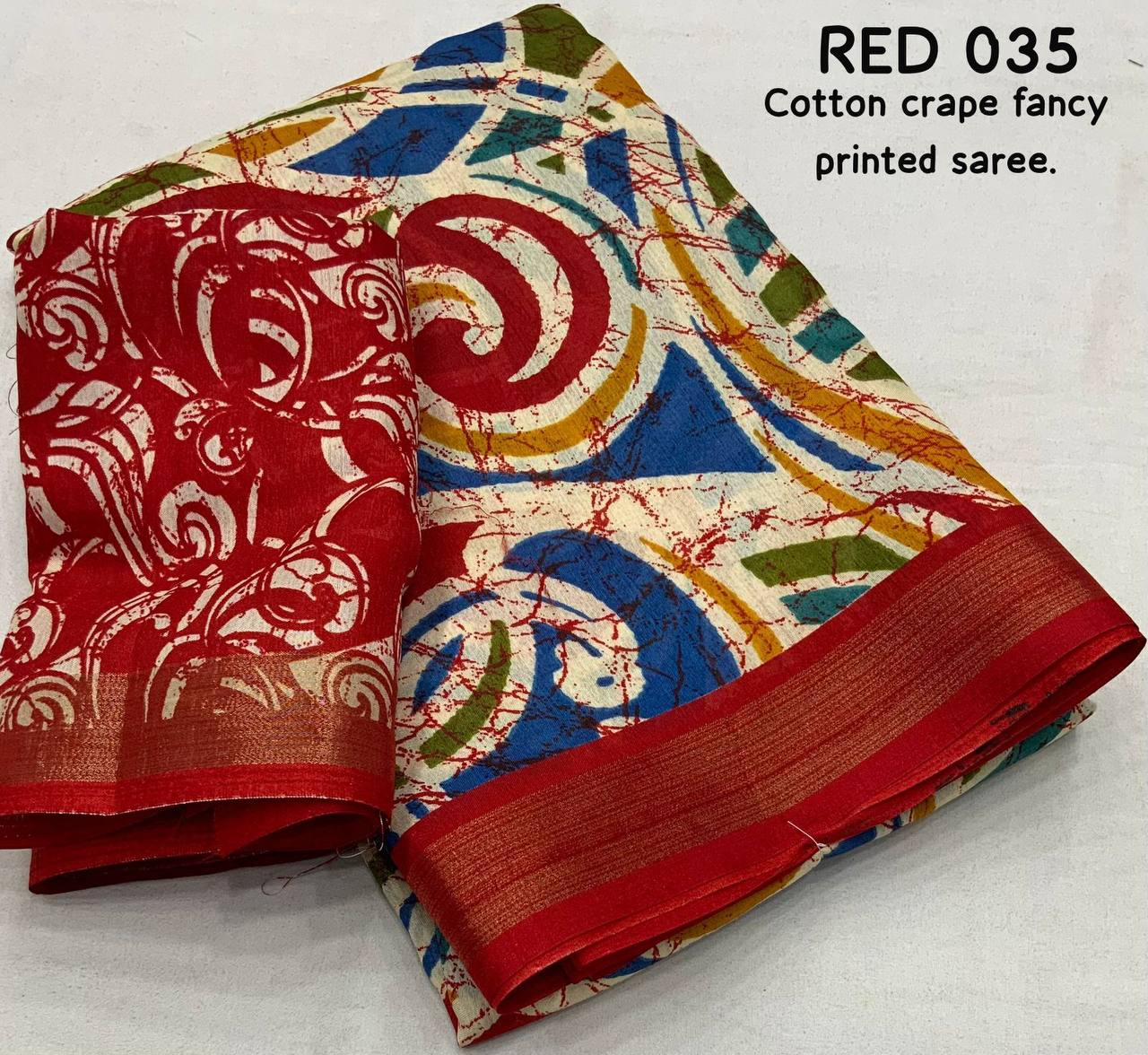 Red Color Soft Cotton Crape Multicolor Batik Style Print Saree