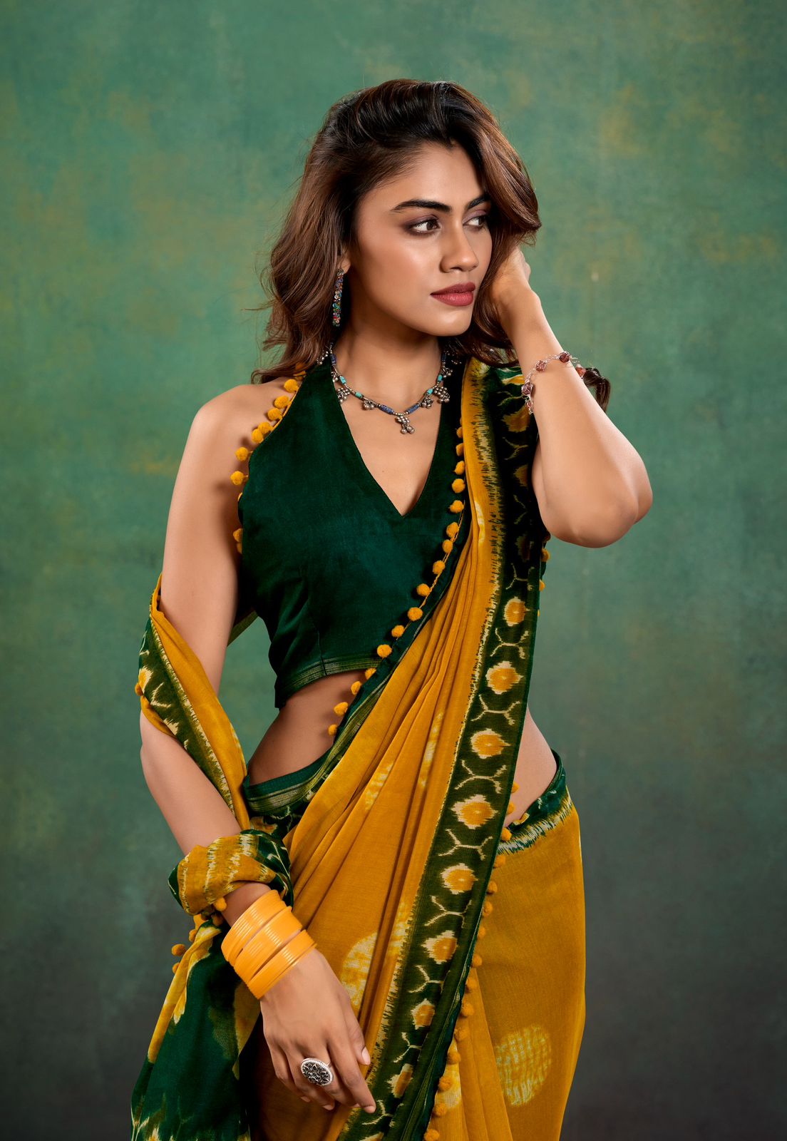 Mustard Color Soft Mulmul Cotton Saree With Beautiful Design And Fancy Pom Pom Border