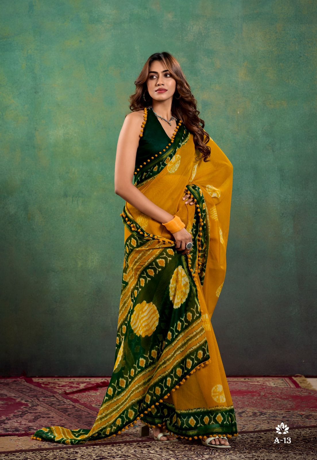 Mustard Color Soft Mulmul Cotton Saree With Beautiful Design And Fancy Pom Pom Border