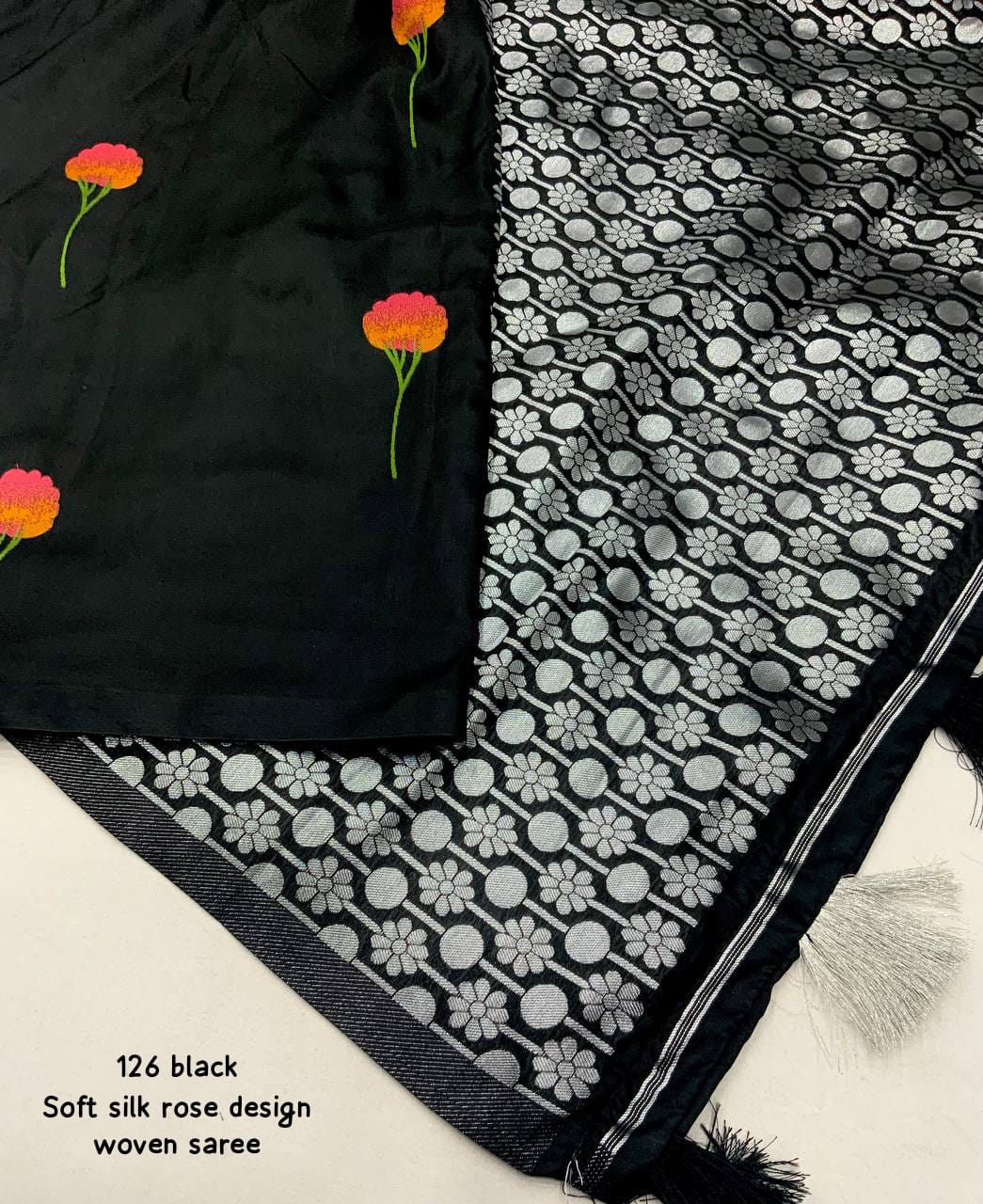 Black Color Premium Soft Silk Saree With All Over Woven Rose Design And Silver Zari Woven Butti Soft Silk Blouse