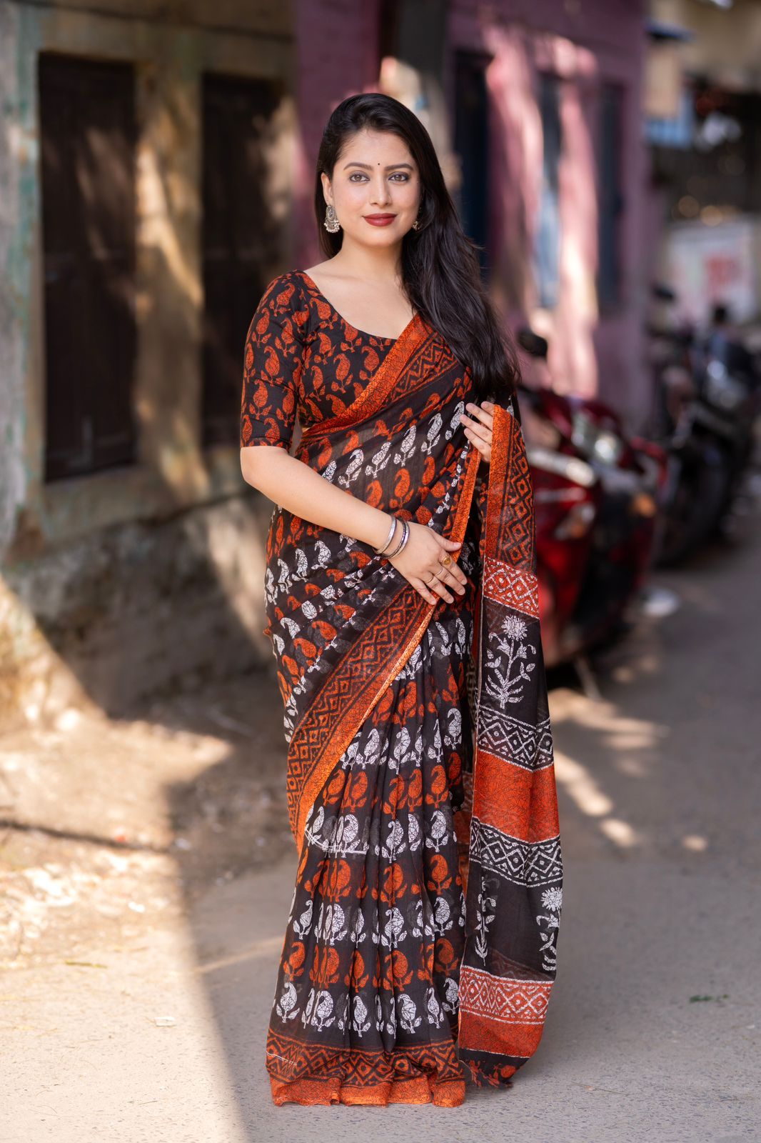 Black and Orange Color Soft Linen Printed Saree