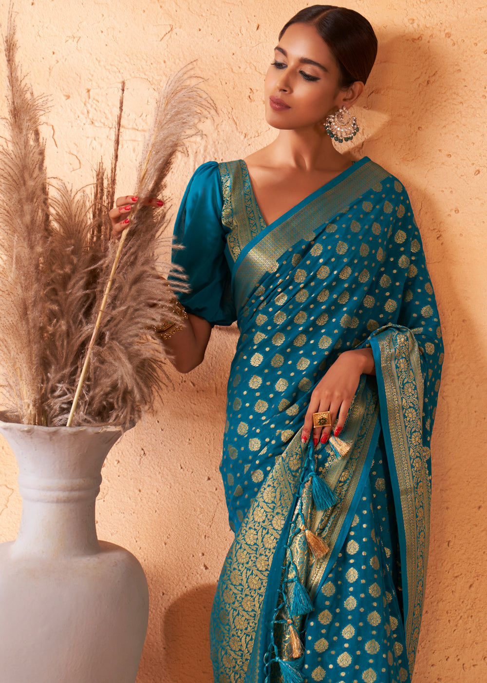 Teal Blue Woven Georgette Saree