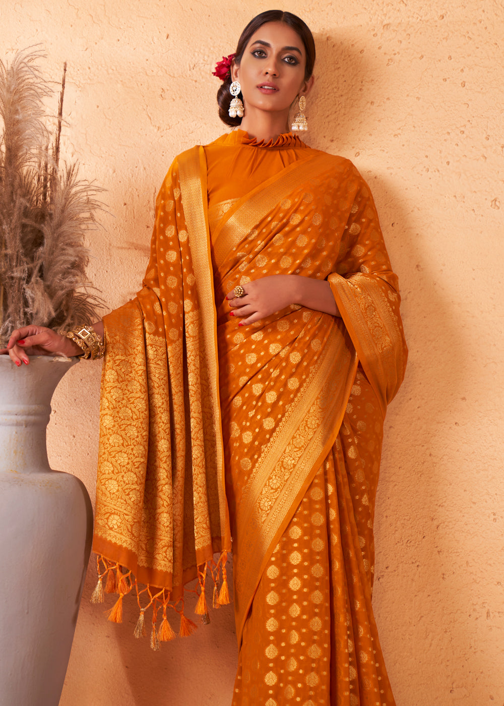 Brandy Punch Yellow Woven Georgette Saree