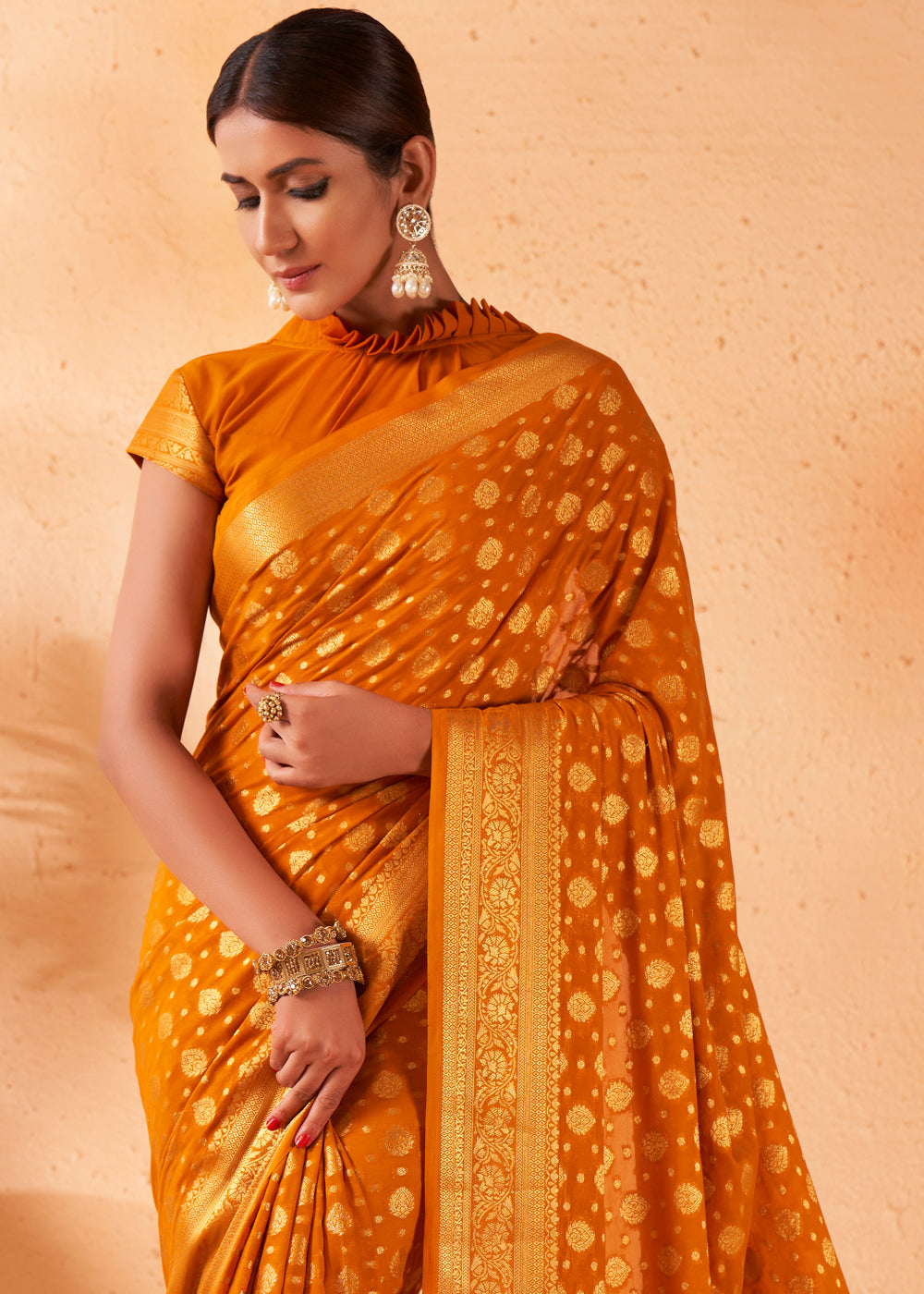 Brandy Punch Yellow Woven Georgette Saree