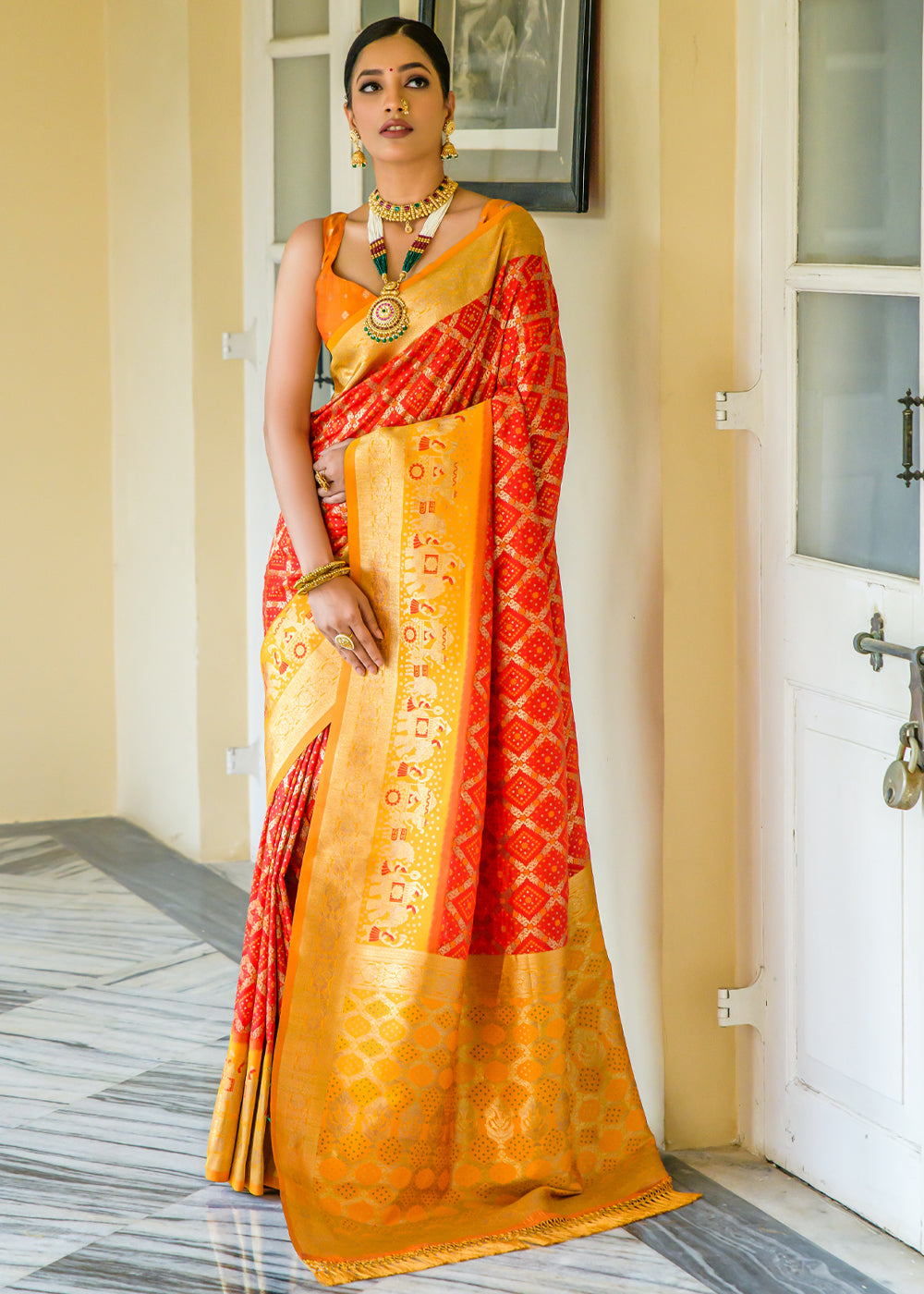 Outrageous Orange Woven Banarasi Bandhani Silk Saree