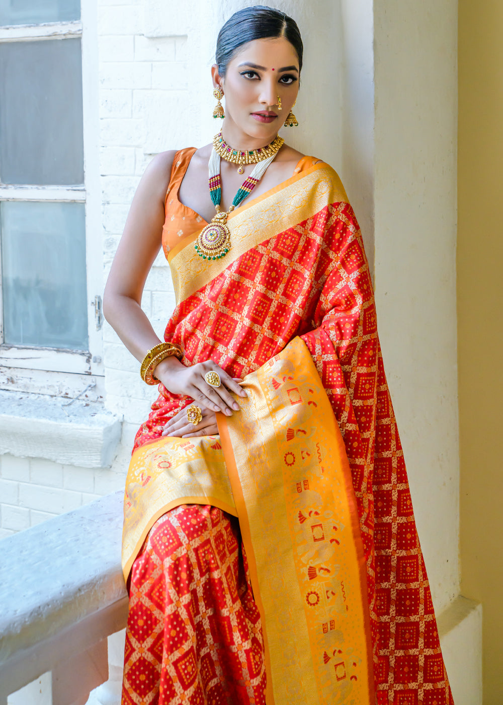 Outrageous Orange Woven Banarasi Bandhani Silk Saree