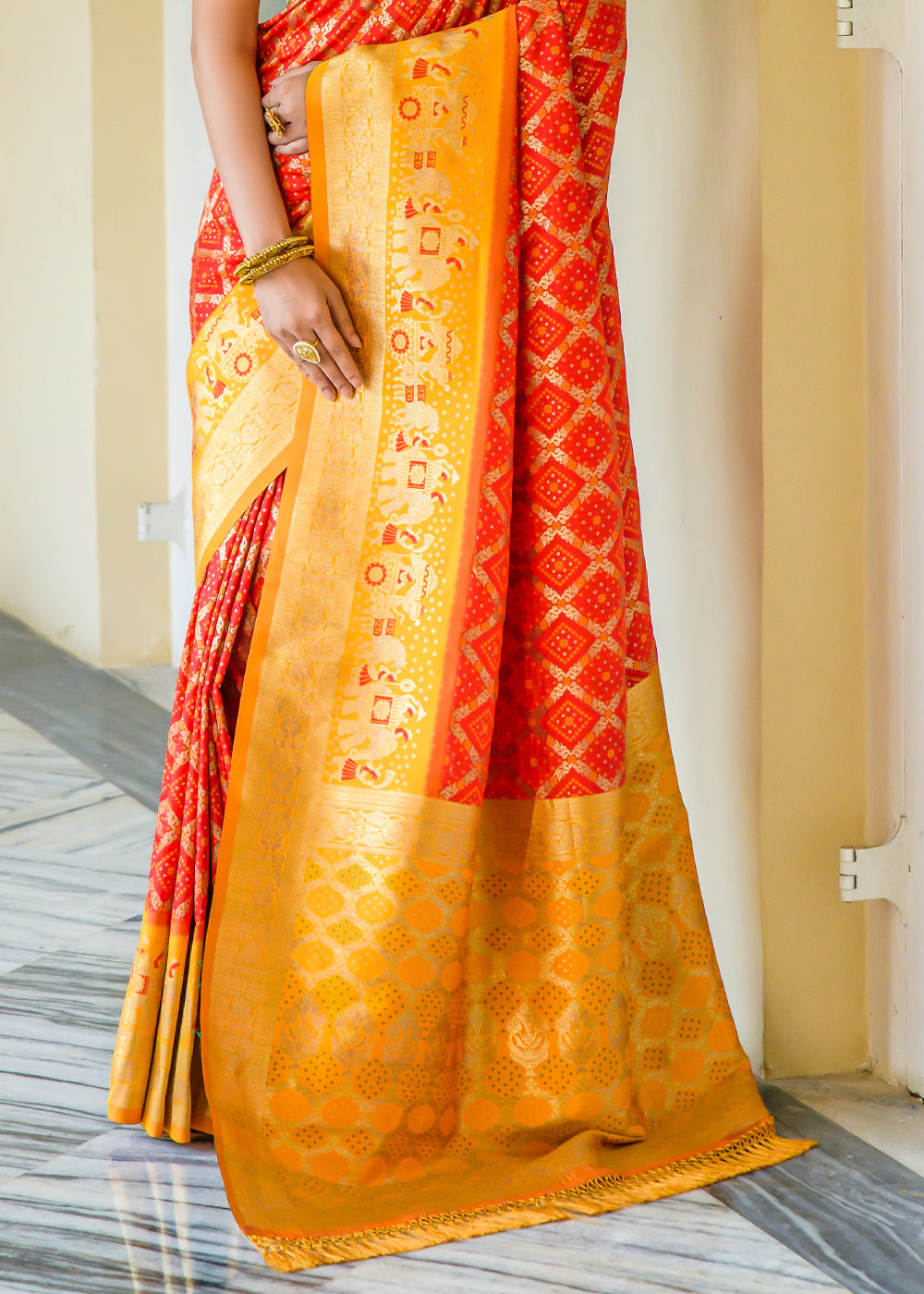 Outrageous Orange Woven Banarasi Bandhani Silk Saree