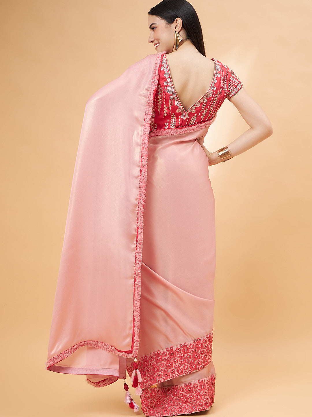 Shimmering Peach Georgette Designer Saree