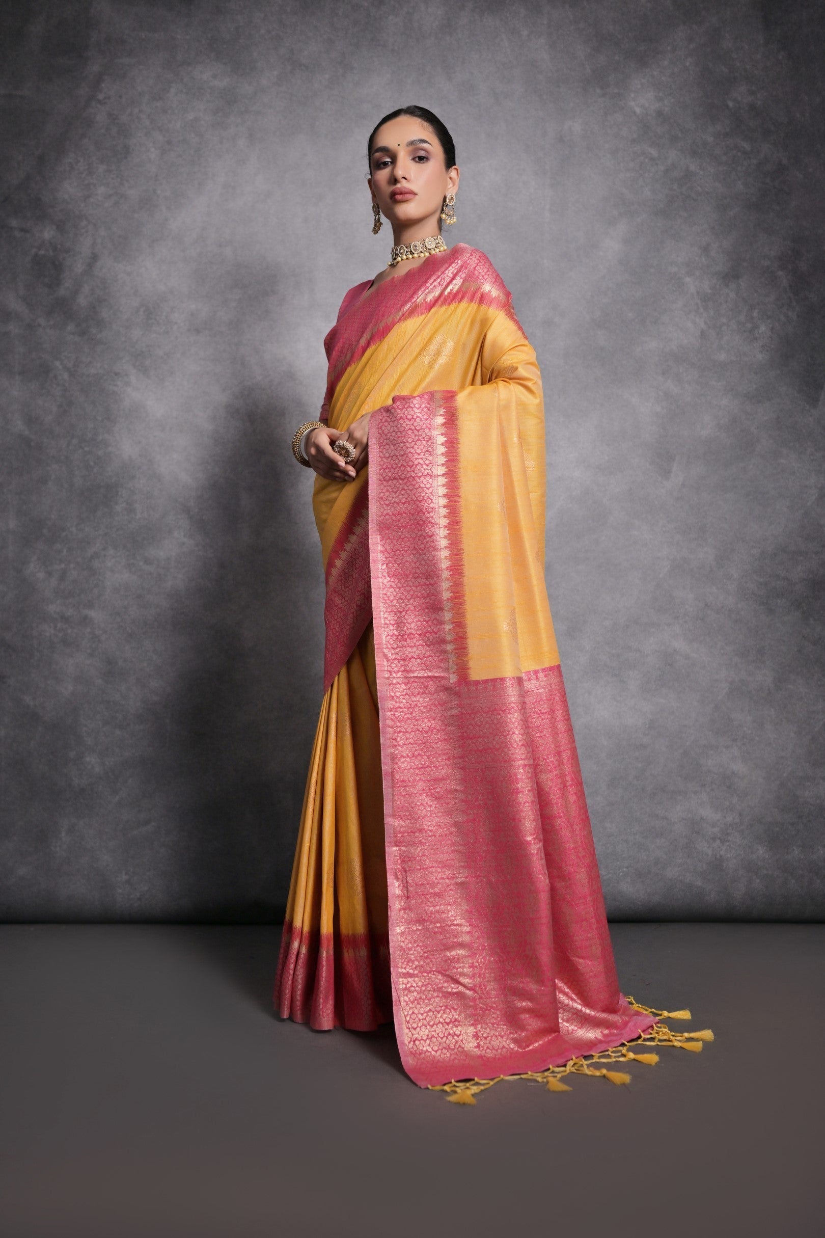 Porsche Yellow Tussar Temple Border Silk Saree