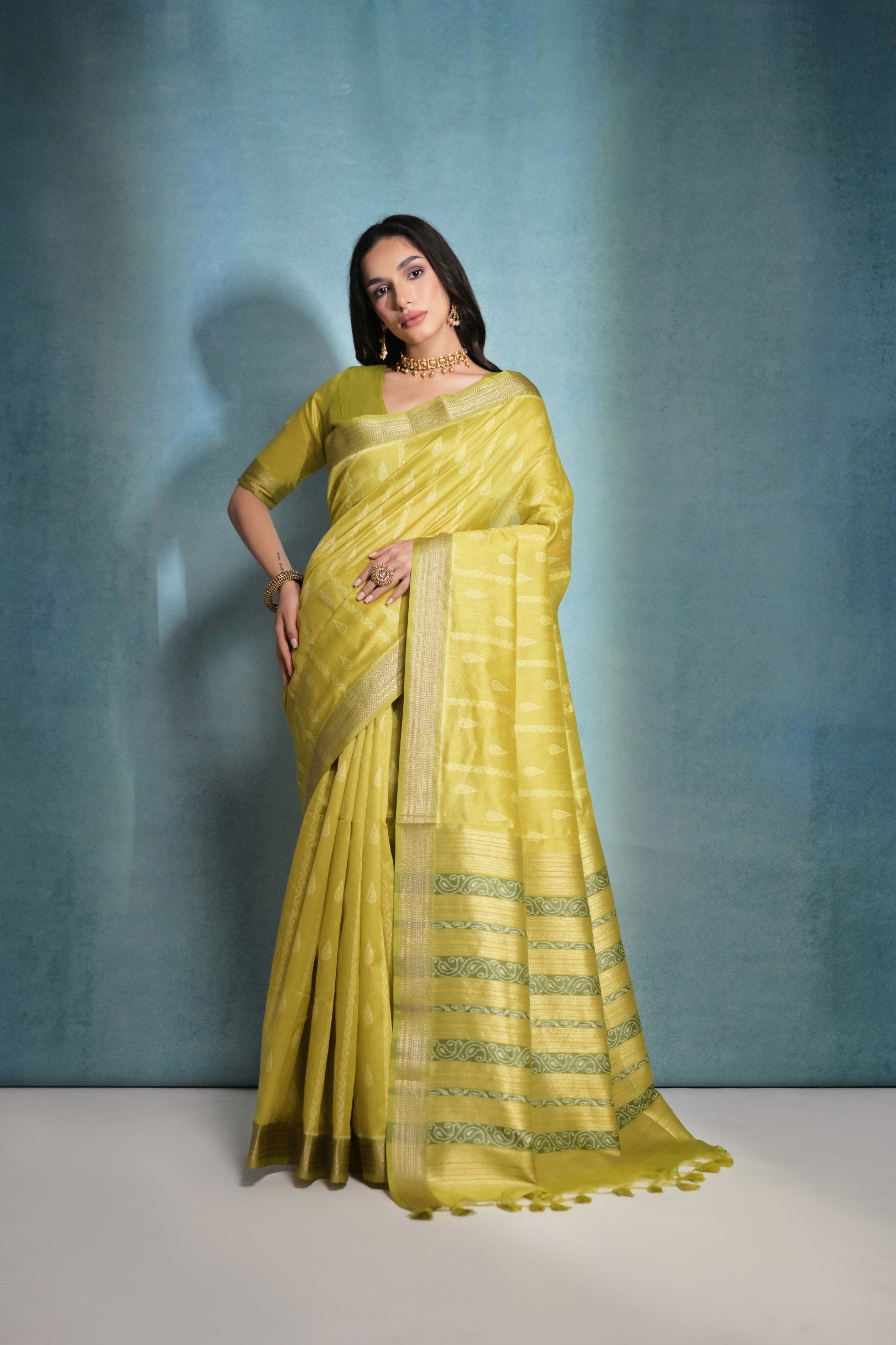 Calico Yellow Ikkat Woven Raw Silk Saree