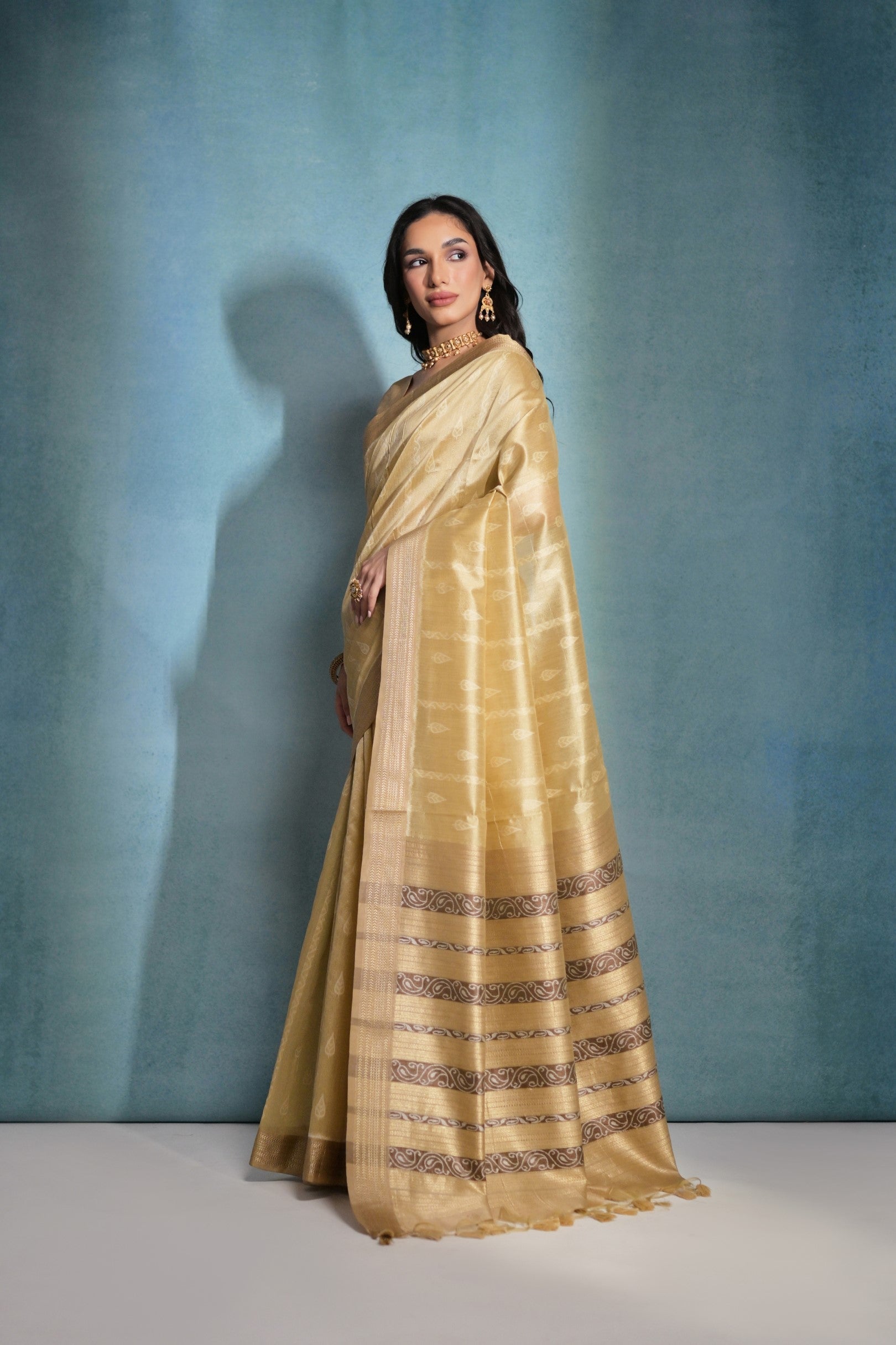 Laser Yellow Ikkat Woven Raw Silk Saree