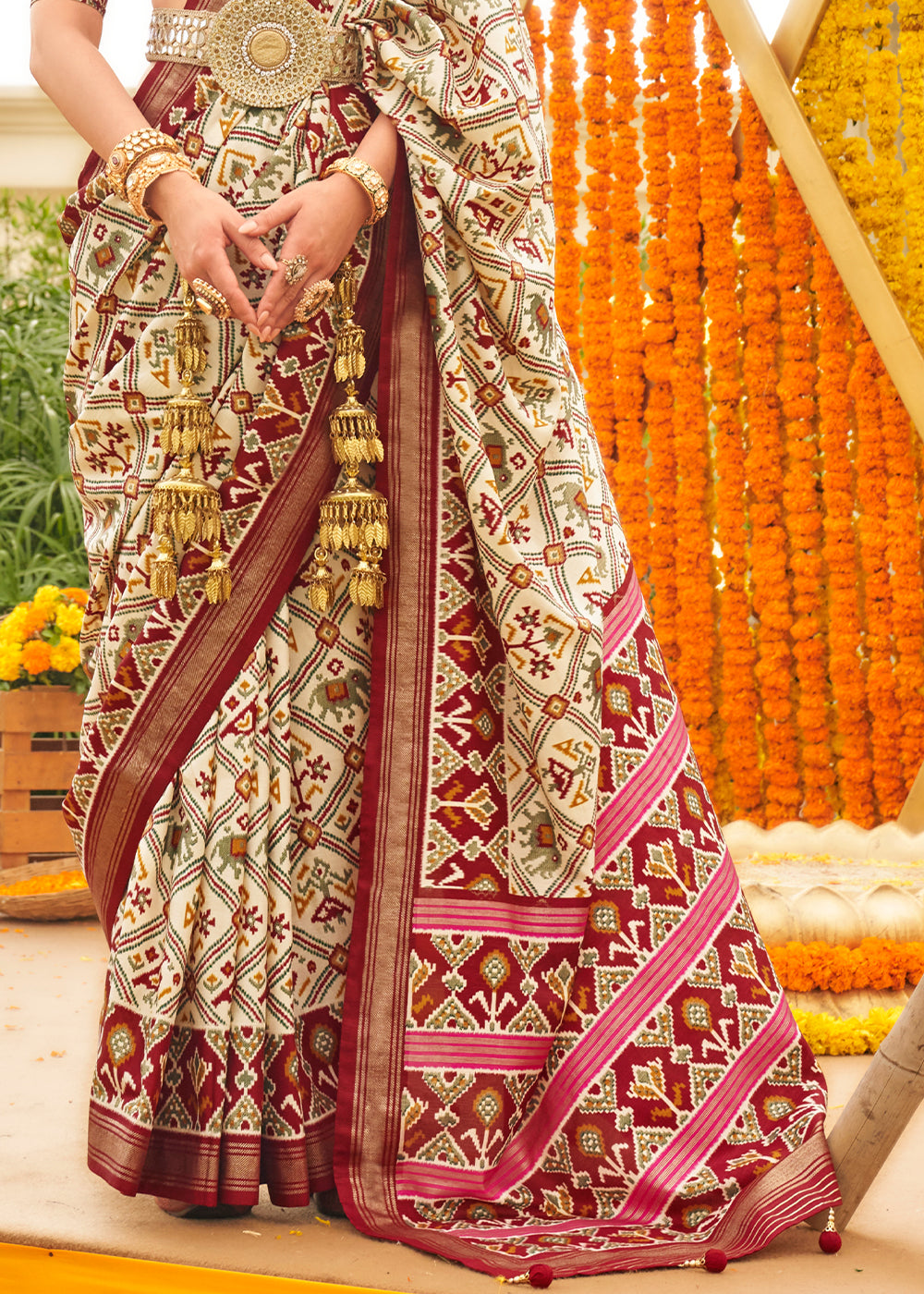 Nvajo White and Brown Printed Patola Silk Saree