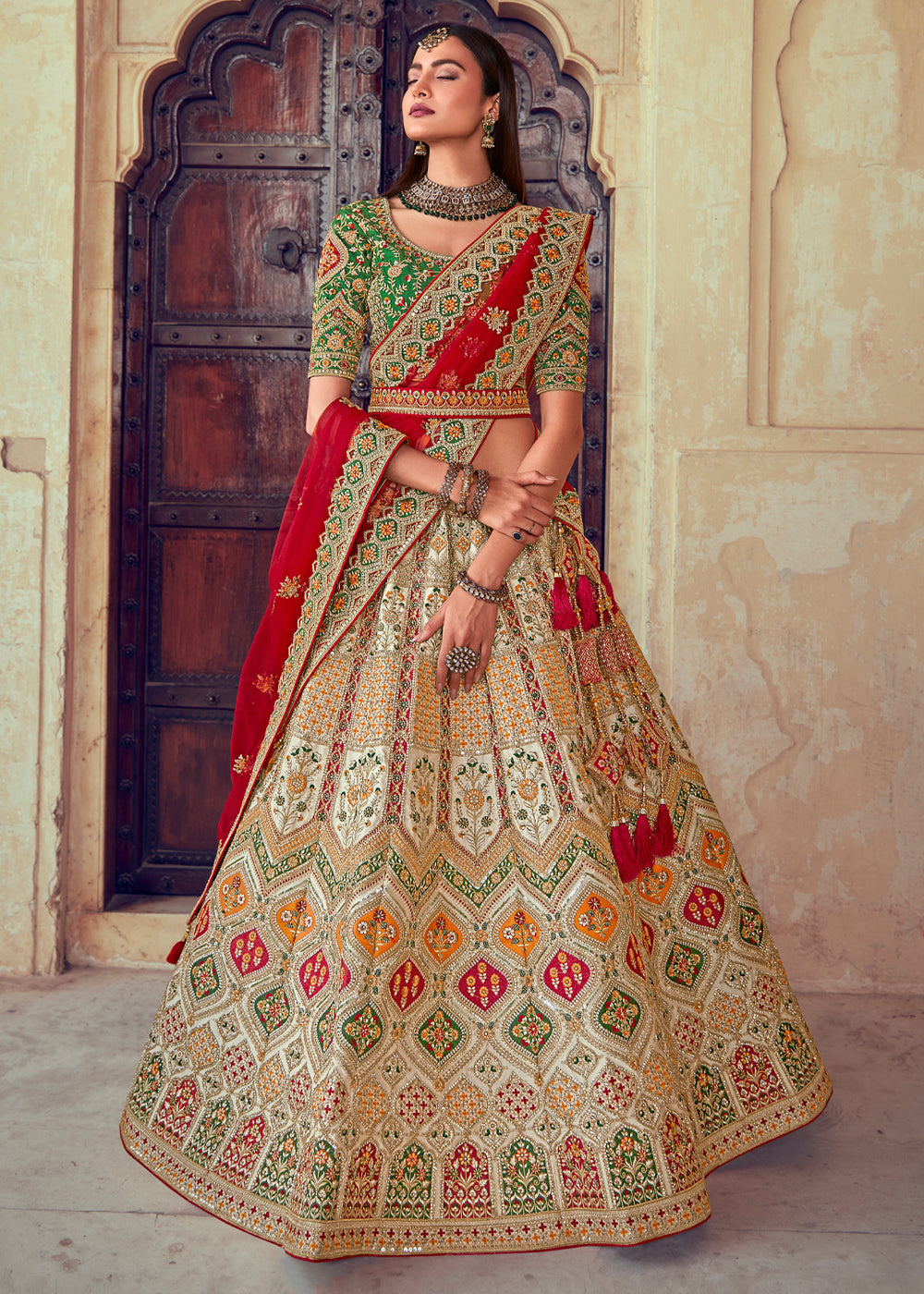 Cognac Red and Green Heavy Embroidered Designer Lehenga