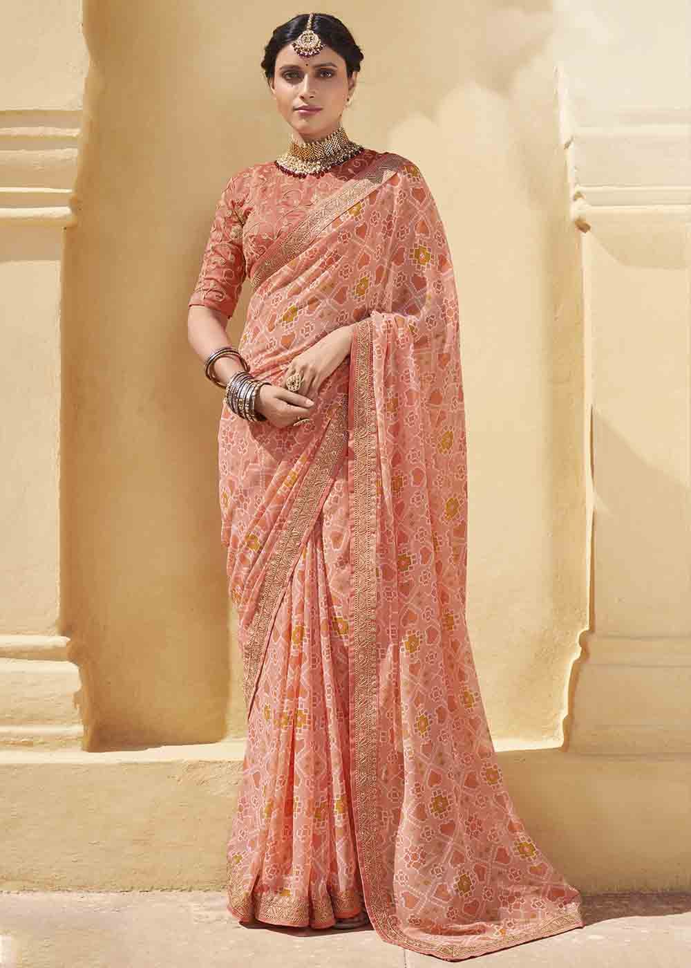 Tonys Peach Patola Print Georgette Saree With Embroidered Blouse