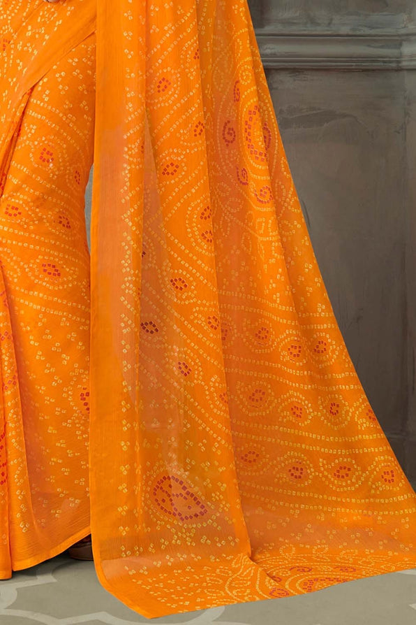 Salomie Orange Chiffon Bandhani Printed Saree