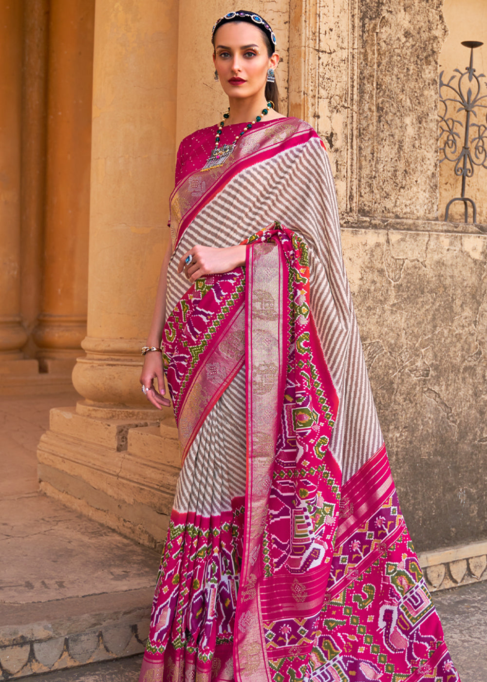 Night White and Dark Pink Zari Woven Patola Saree